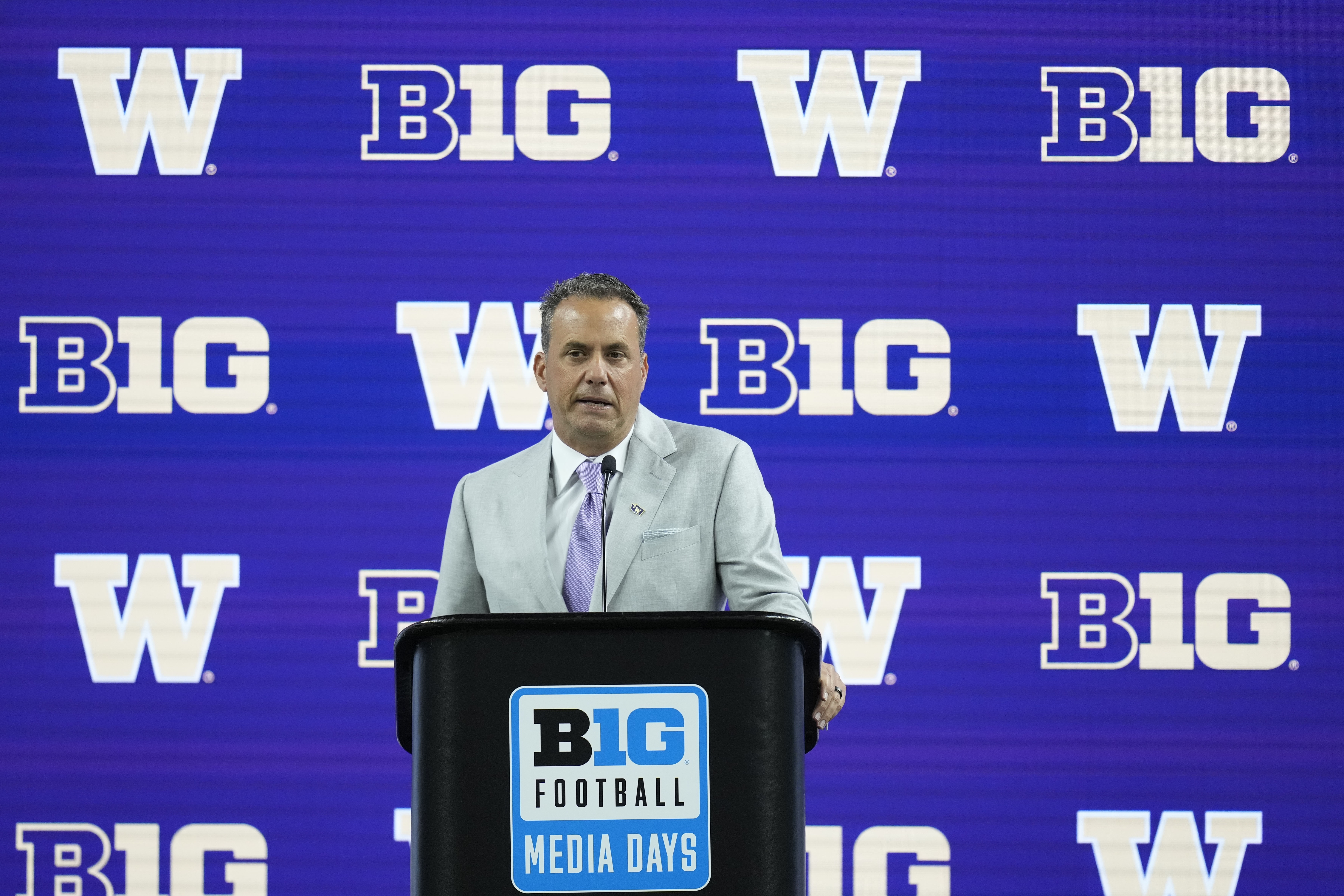 Washington head coach Jedd Fisch speaks during an NCAA college football news conference at the Big Ten Conference media days at Lucas Oil Stadium, Thursday, July 25, 2024, in Indianapolis. 