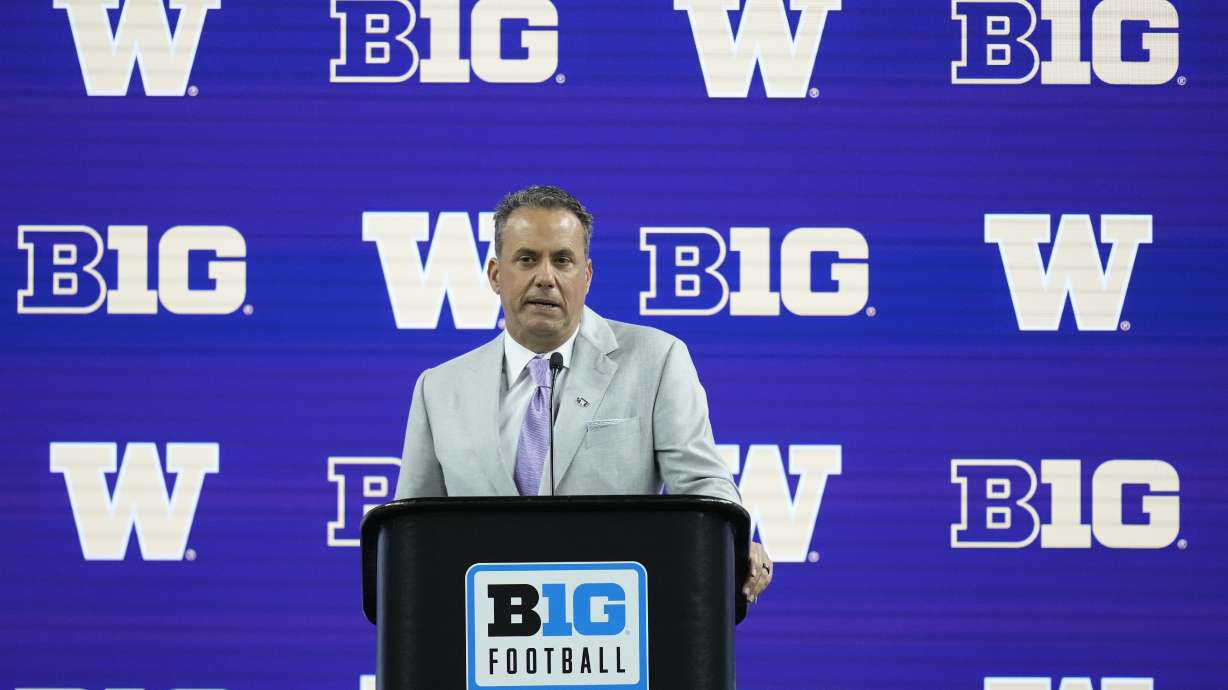 Washington head coach Jedd Fisch speaks during an NCAA college football news conference at the Big Ten Conference media days at Lucas Oil Stadium, Thursday, July 25, 2024, in Indianapolis.