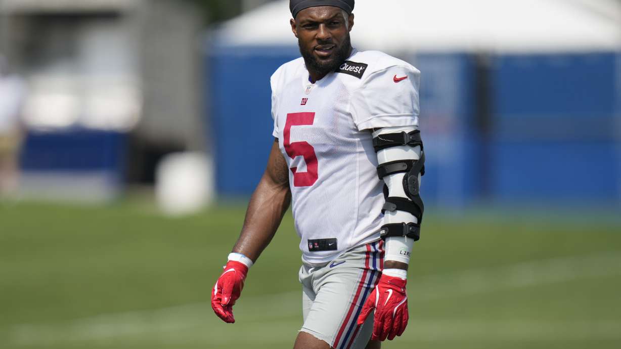 New York Giants' Kayvon Thibodeaux participates in a drill during the NFL football team's training camp in East Rutherford, N.J., Sunday, July 28, 2024.