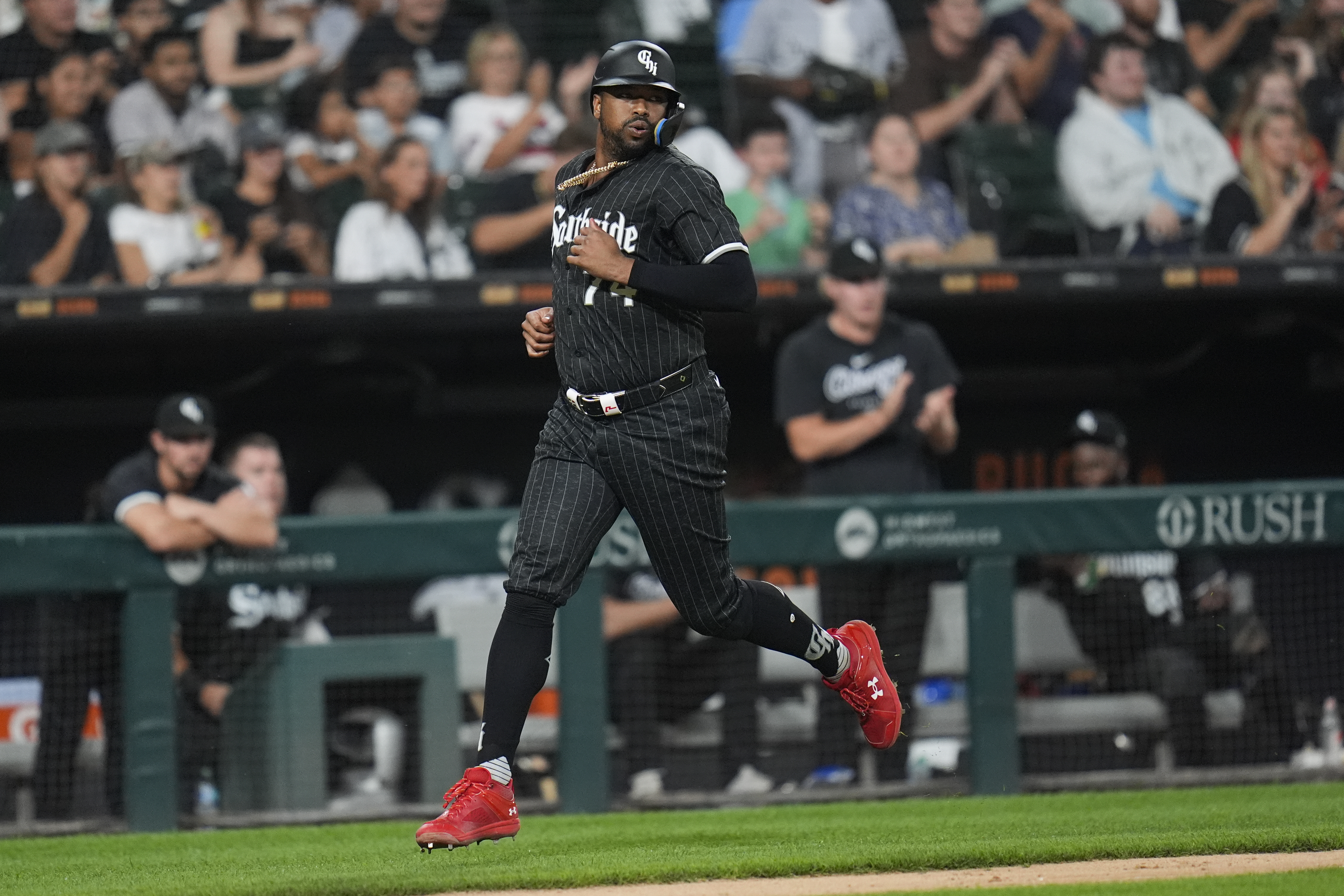 Chicago White Sox designated hitter Eloy Jiménez runs the bases to score on a double by Andrew Benintendi during the sixth inning of a baseball game against the Kansas City Royals, Monday, July 29, 2024, in Chicago.