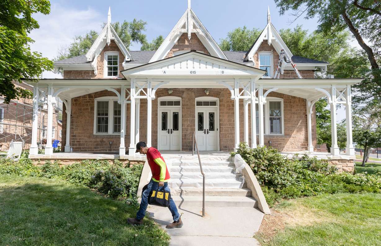 Franco Lera, a worker with the University of Utah, carries his tools around while working on a building in Officers Circle, which was a part of the 2002 Olympic Village on the campus of the University of Utah in Salt Lake City on Tuesday, July 30, 2024.