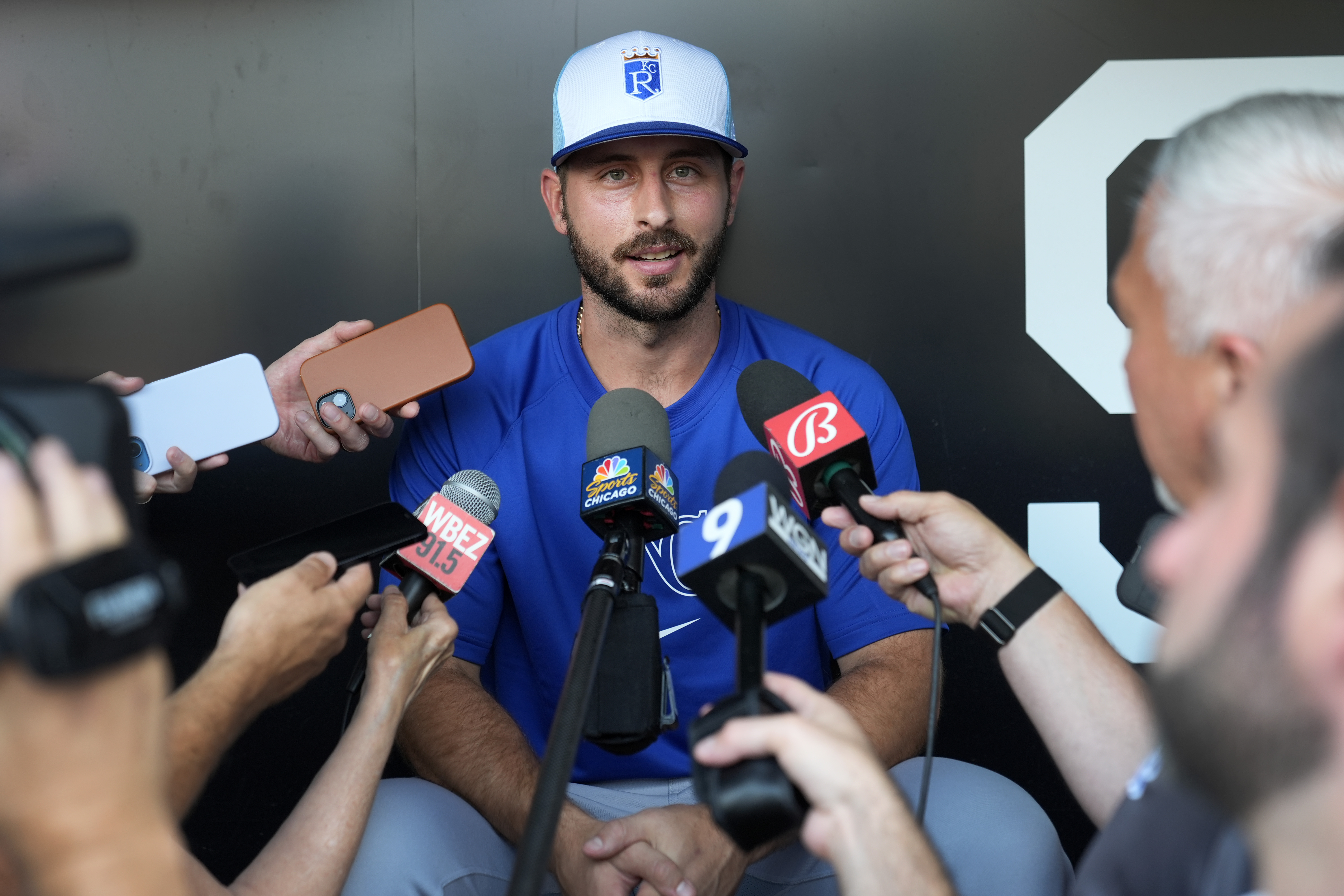 Kansas City Royals' Paul DeJong talks to reporters shortly after being traded from the Chicago White Sox to the Royals before a baseball game between the two clubs Tuesday, July 30, 2024, in Chicago. 