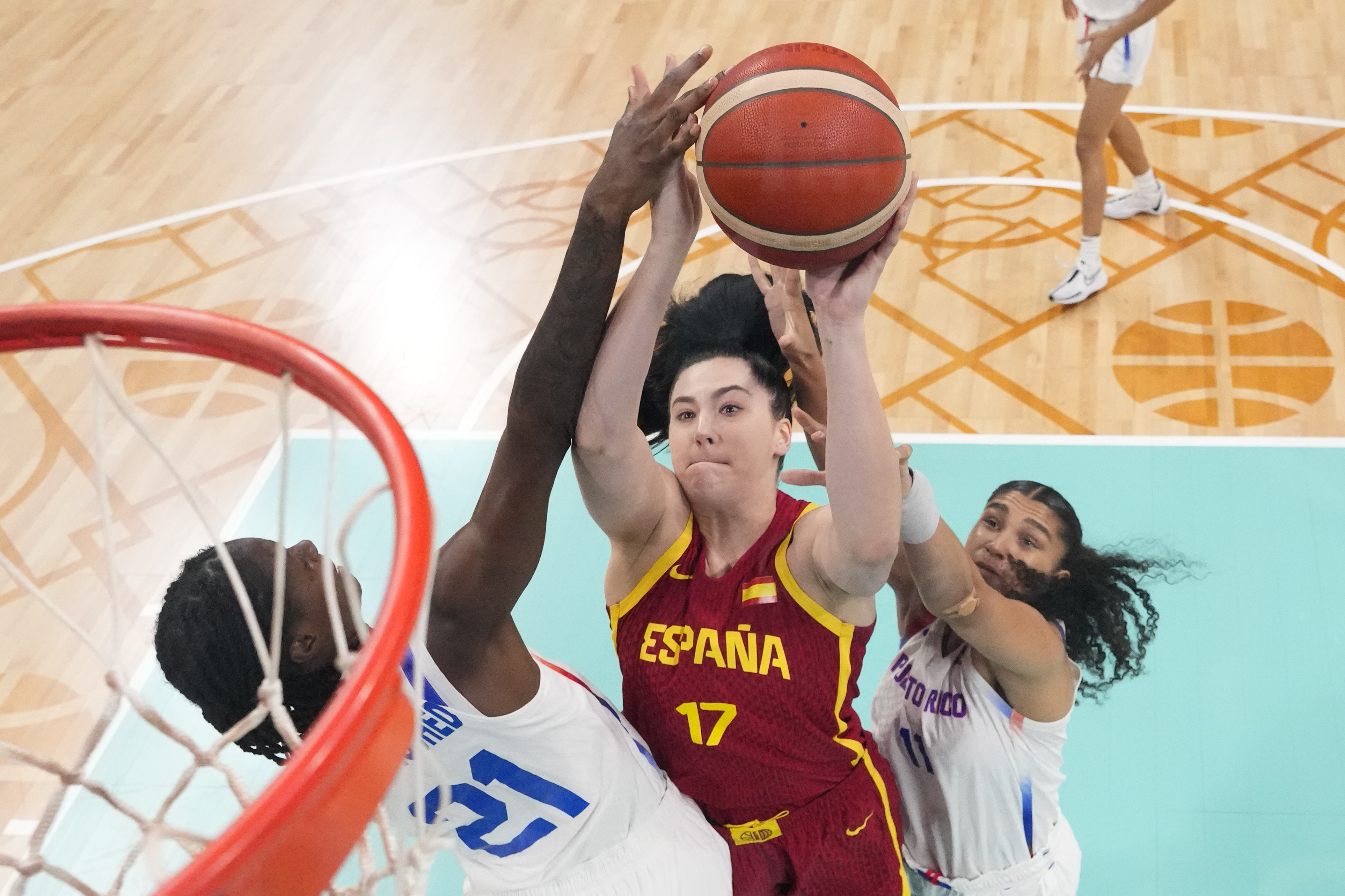 Jovana Nogic, of Serbia, shoots between in a women's basketball game at the 2024 Summer Olympics, Wednesday, July 31, 2024, in Villeneuve-d'Ascq, France. 