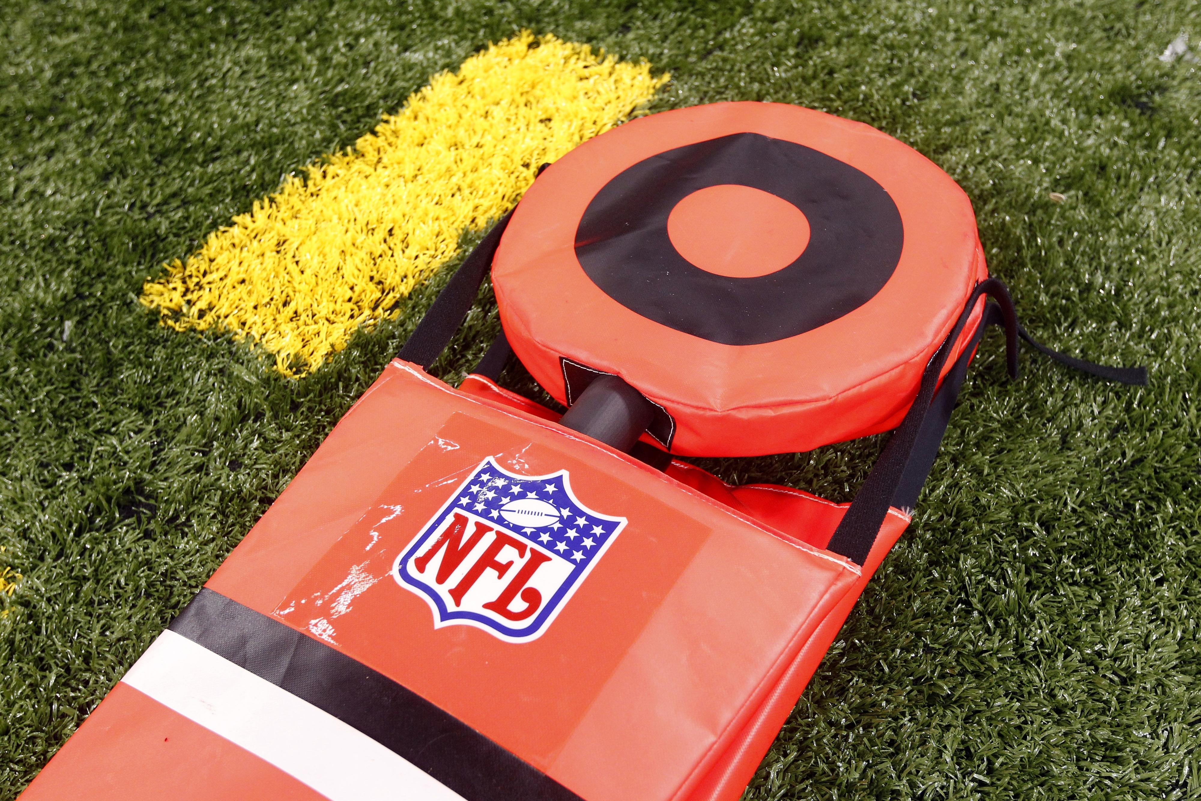 FILE - Chain gang first down marker during an NFL preseason football game between the New Orleans Saints and the Kansas City Chiefs at the Mercedes-Benz Superdome in New Orleans, Friday, Aug. 9, 2013. The NFL is moving closer to replacing the chain gang with new technology to measure line to gain. 