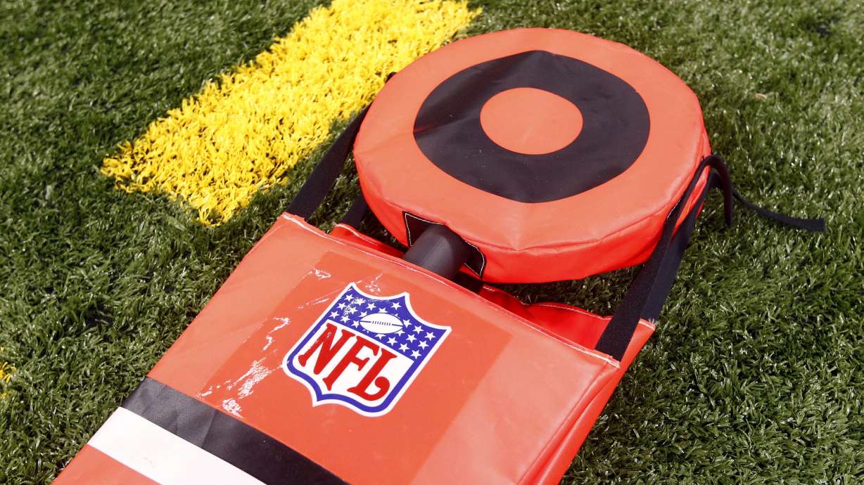 FILE - Chain gang first down marker during an NFL preseason football game between the New Orleans Saints and the Kansas City Chiefs at the Mercedes-Benz Superdome in New Orleans, Friday, Aug. 9, 2013. The NFL is moving closer to replacing the chain gang with new technology to measure line to gain.