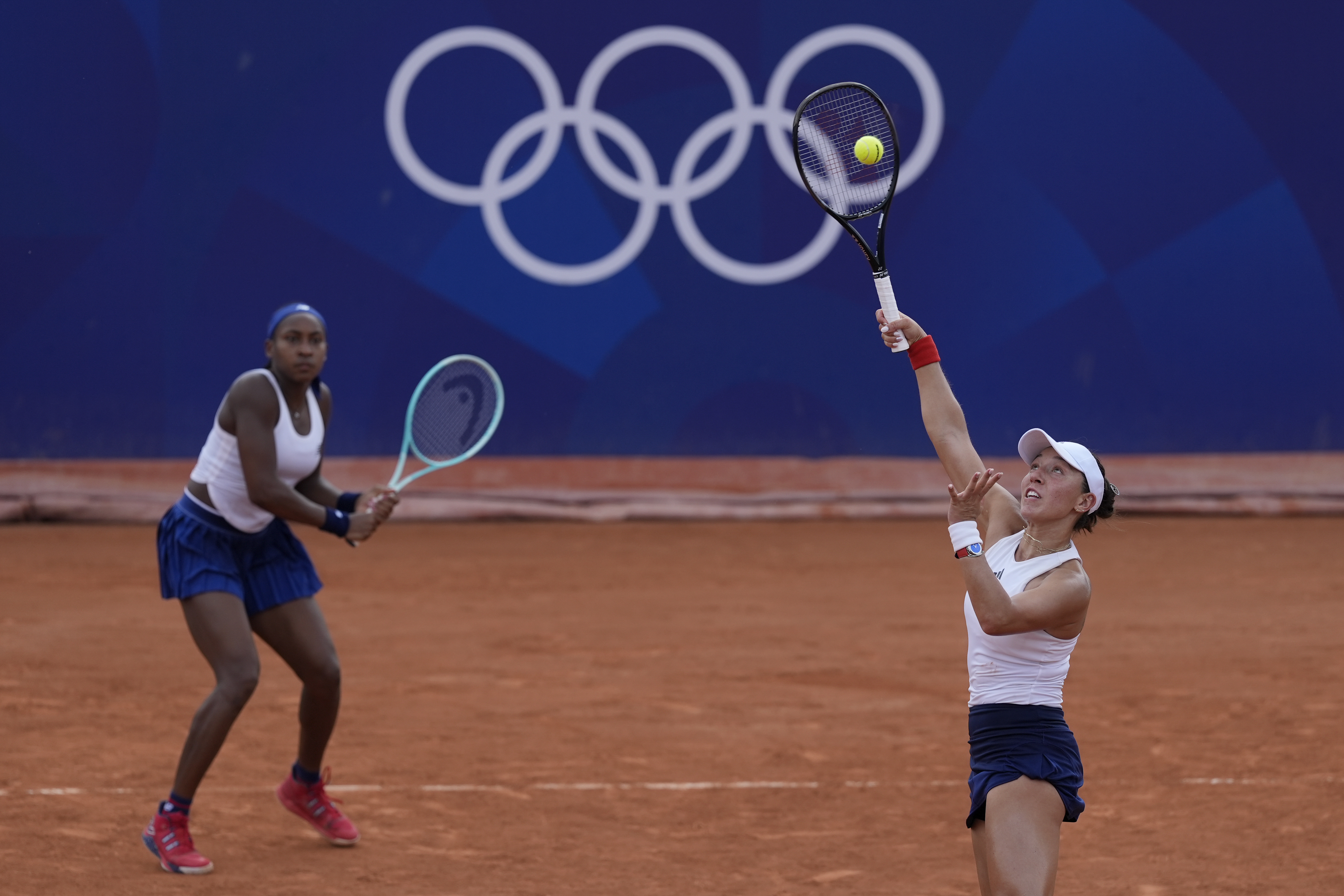 Coco Gauff and Jessica Pegula of the United States play Linda Noskova and Karolina Muchova of the Czech Republic during their women's doubles match, at the 2024 Summer Olympics, Wednesday, July 31, 2024, at the Roland Garros stadium in Paris, France. 