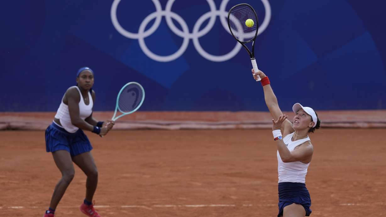 Coco Gauff and Jessica Pegula of the United States play Linda Noskova and Karolina Muchova of the Czech Republic during their women's doubles match, at the 2024 Summer Olympics, Wednesday, July 31, 2024, at the Roland Garros stadium in Paris, France.