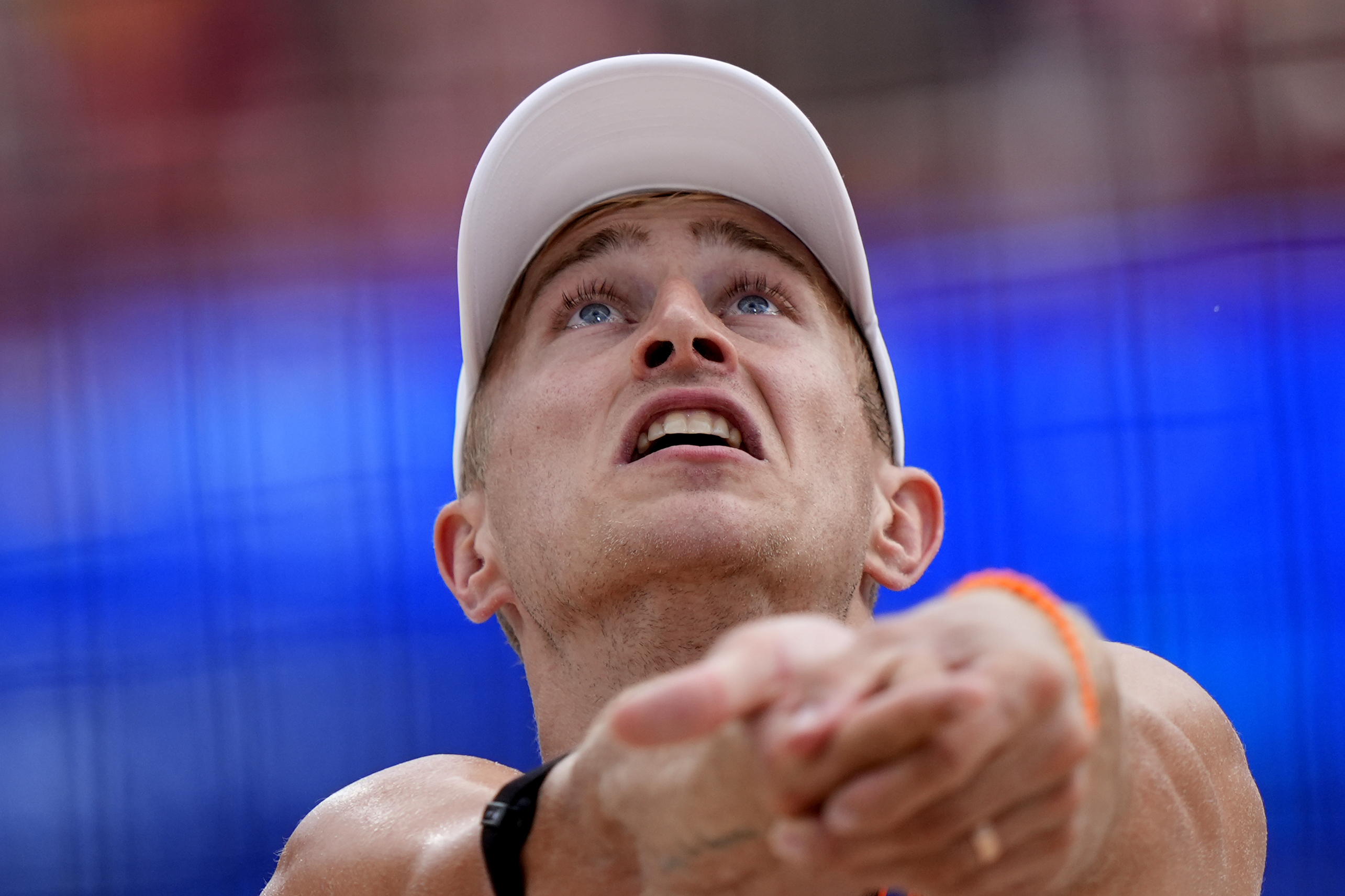 The Netherland's Steven van de Velde gets set to return a shot against Chile in a beach volleyball match at the 2024 Summer Olympics, Wednesday, July 31, 2024, in Paris, France.