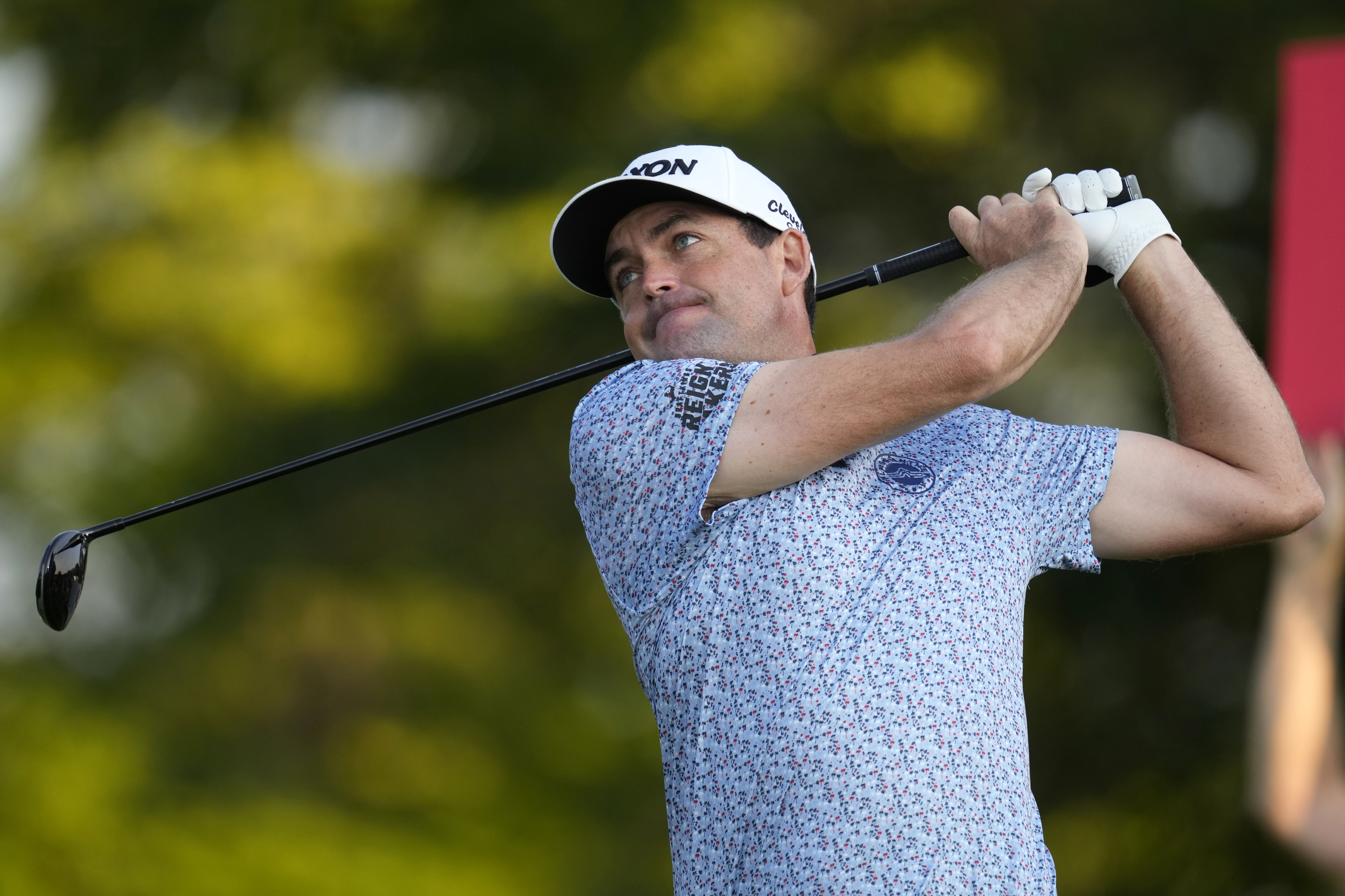 Keegan Bradley watches his tee shot on the 10th hole during the first round of the 3M Open golf tournament at the Tournament Players Club, Thursday, July 25, 2024, in Blaine, Minn. 