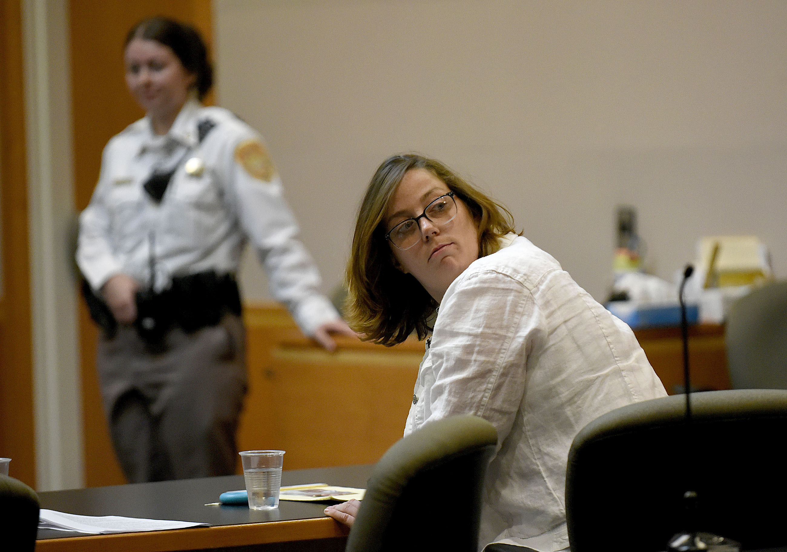 Defendant Alexandra Eckersley looks back during her trial at Hillsborough County Superior Court, Monday, July 29, 2024, in Manchester, N.H. Eckersley, the daughter of baseball Hall of Fame pitcher Dennis Eckersley, is accused of abandoning her baby after giving birth in the woods in subfreezing temperatures on Christmas night in 2022. 