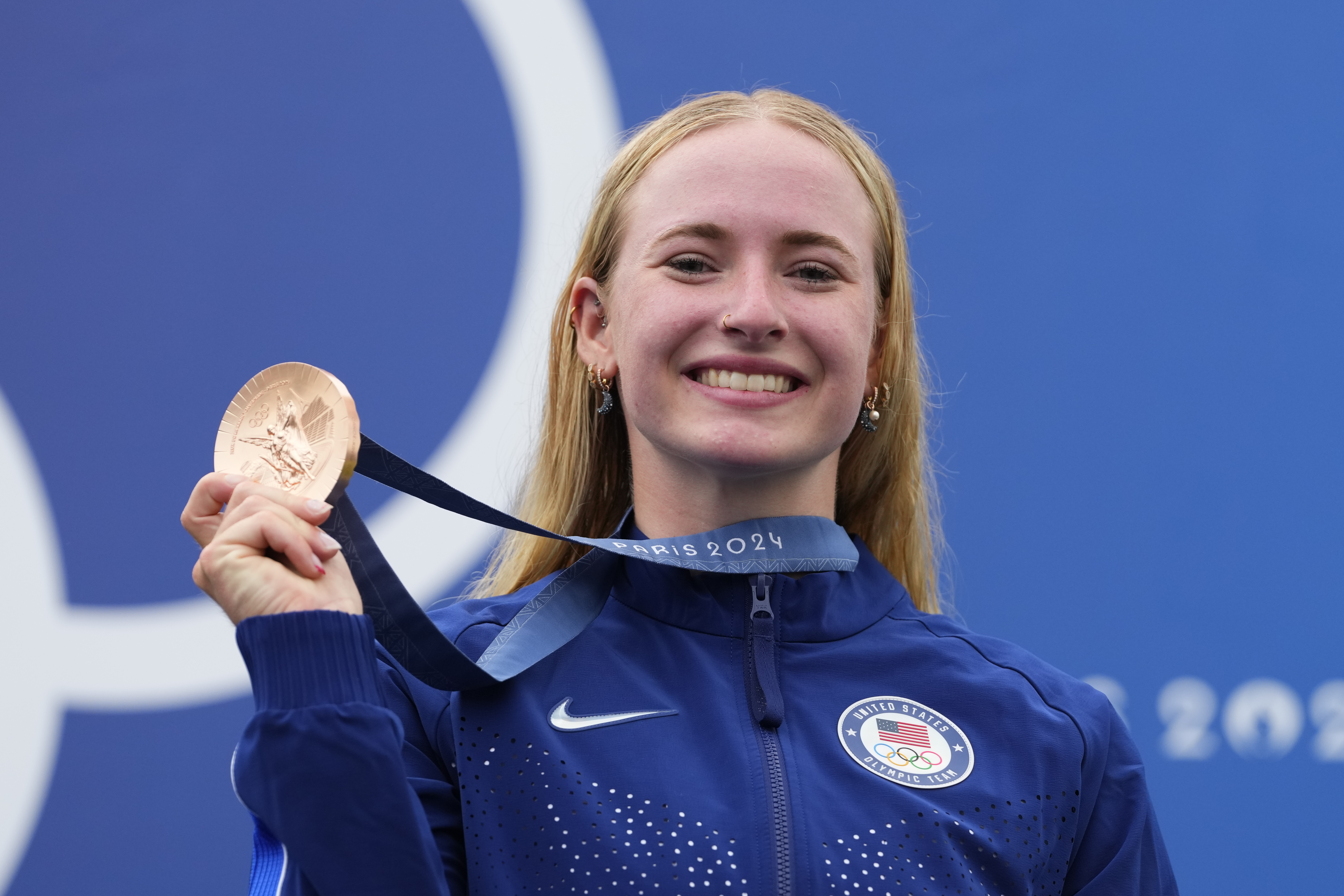 Evy Leibfarth of the United States celebrates with the bronze medal in the women's canoe single finals at the 2024 Summer Olympics, Wednesday, July 31, 2024, in Vaires-sur-Marne, France. 