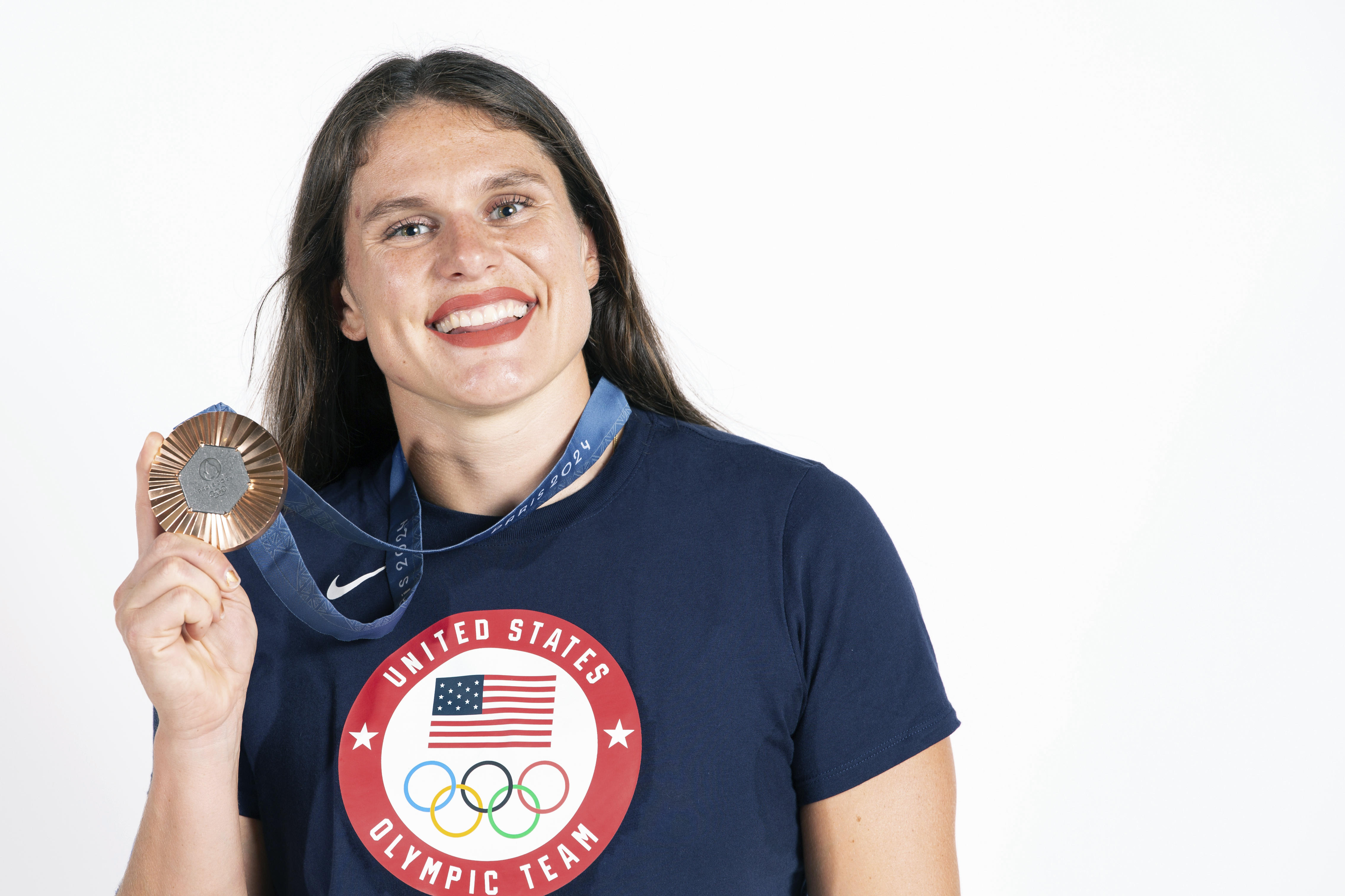 United States' Ilona Maher, bronze medalist in the women's rugby sevens, poses for a portrait with her medal at Champions Park during the 2024 Summer Olympics in Paris, France, Wednesday, July 31, 2024. 