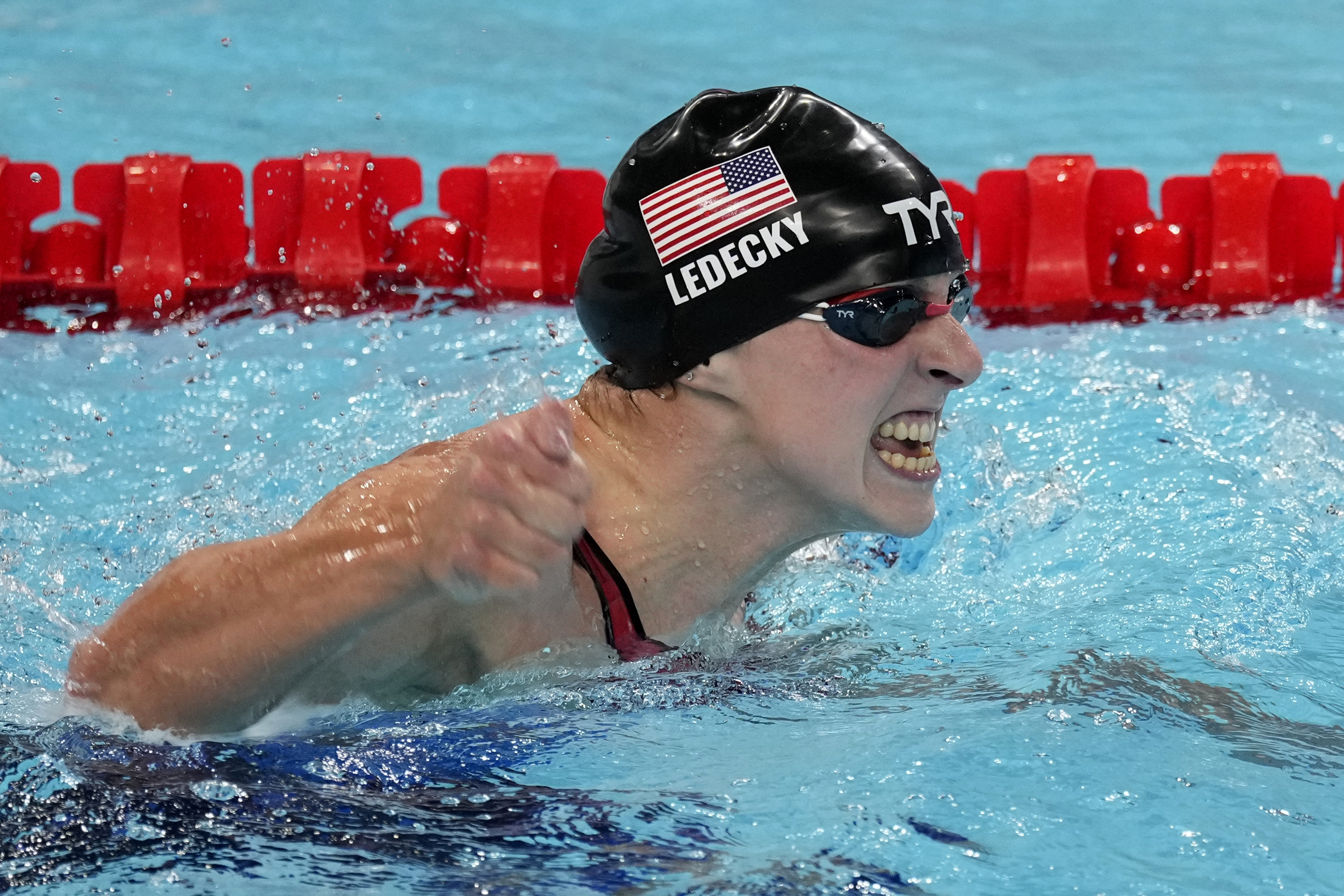 Katie Ledecky, of the United States, celebrates after winning the women's 1500-meter freestyle final at the 2024 Summer Olympics, Wednesday, July 31, 2024, in Nanterre, France. 