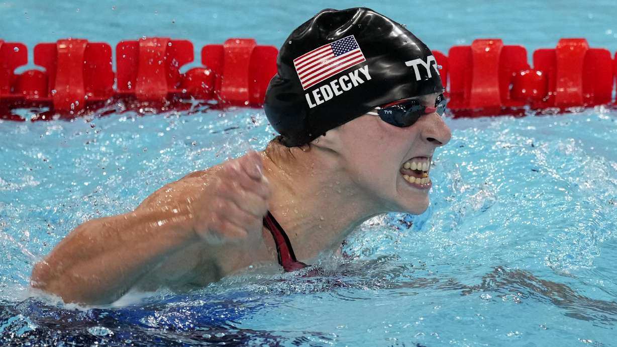Katie Ledecky, of the United States, celebrates after winning the women's 1500-meter freestyle final at the 2024 Summer Olympics, Wednesday, July 31, 2024, in Nanterre, France.