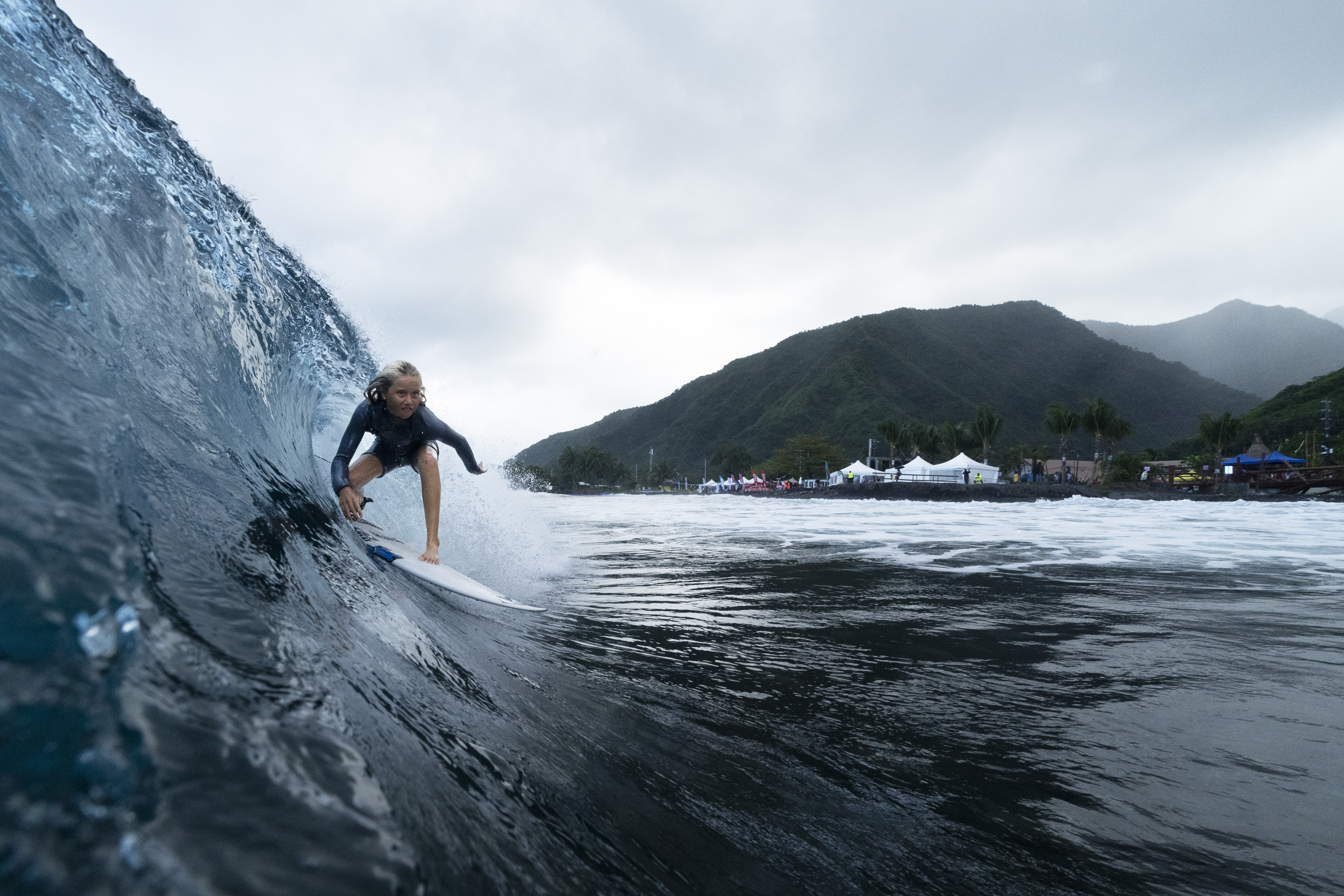 Kelia Gallina, 11, surfs her home shore break during a break in the 2024 Summer Olympics surfing competition, Wednesday, July 31, 2024, in Teahupo'o, Tahiti. While Teahupo'o has been a coveted destination for surfers from around the world for decades, it's only in more recent years that local surf culture and talent has begun to develop across Tahiti. 