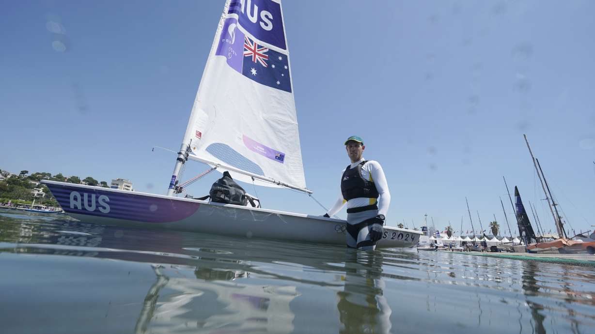 Matt Wearn, of Australia, poses for a portrait before men's dinghy practice at the 2024 Summer Olympics, Thursday, July 25, 2024, in Marseille, France.