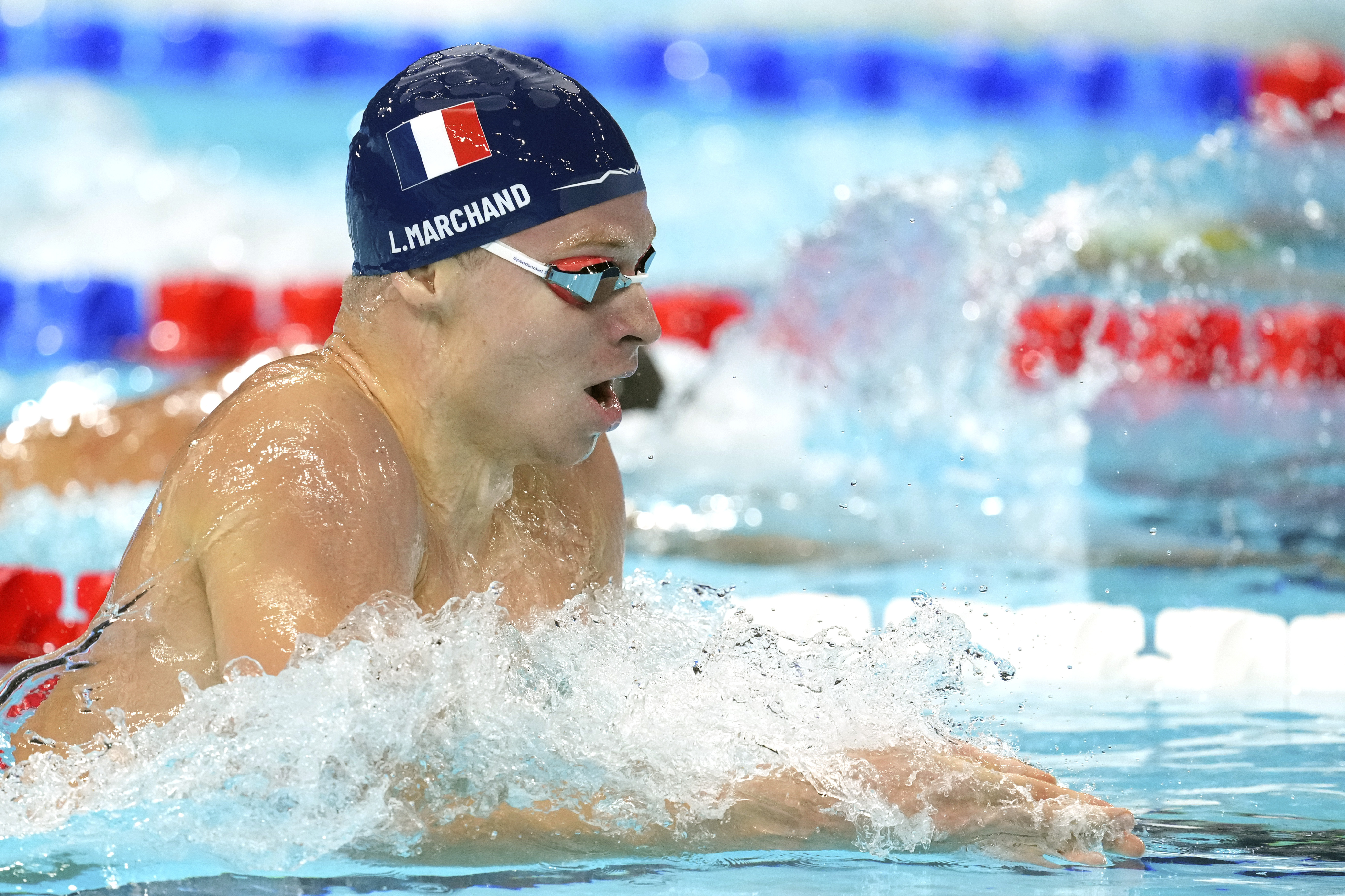 Leon Marchand, of France, competes in the men's 200-meter individual medley at the 2024 Summer Olympics, Thursday, Aug. 1, 2024, in Nanterre, France. 