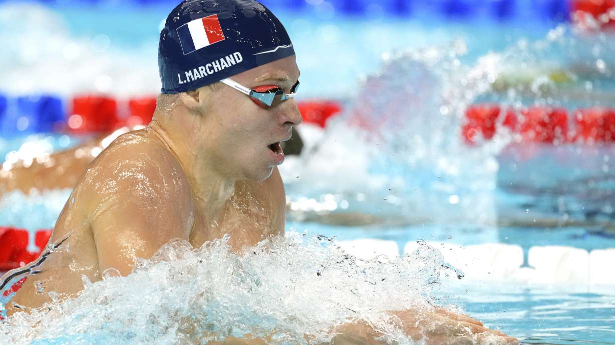 Leon Marchand, of France, competes in the men's 200-meter individual medley at the 2024 Summer Olympics, Thursday, Aug. 1, 2024, in Nanterre, France.