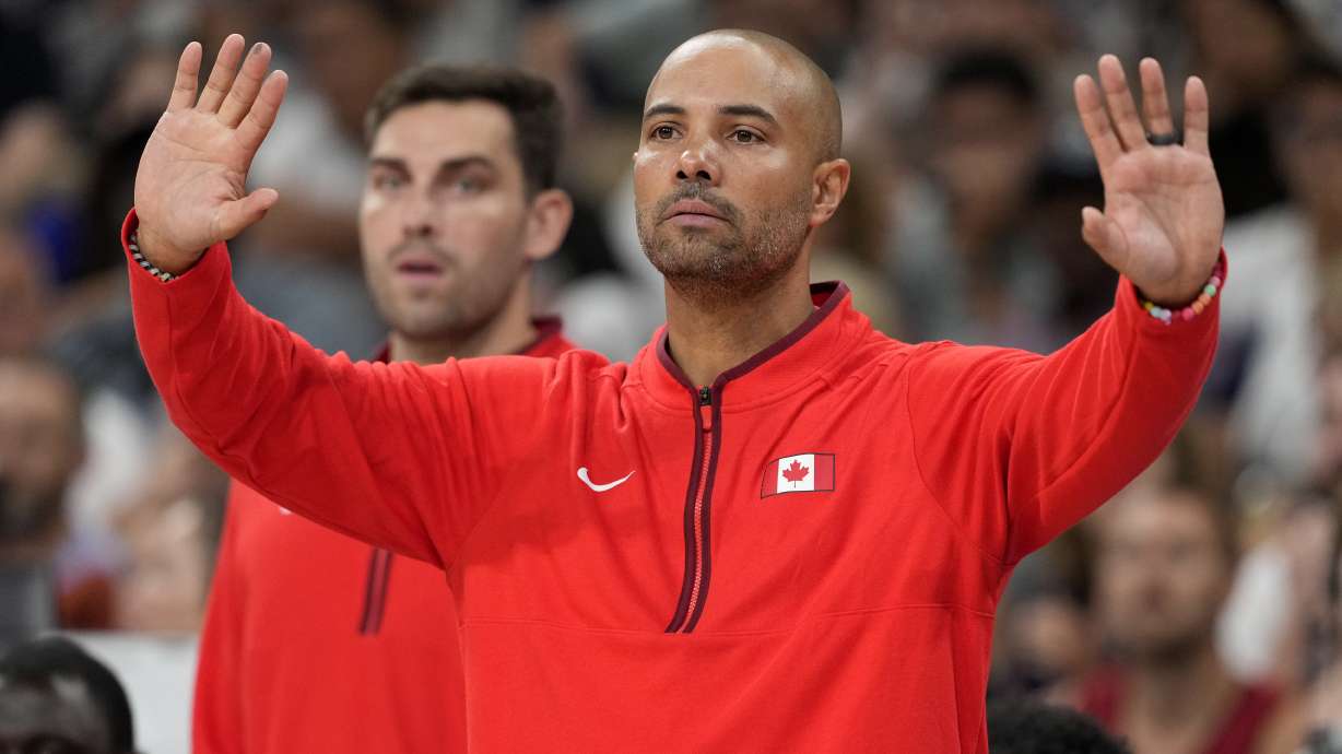 Canada head coach Jordi Fernandez gestures to his team in a men's basketball game against Australia at the 2024 Summer Olympics, Tuesday, July 30, 2024, in Villeneuve-d'Ascq, France.