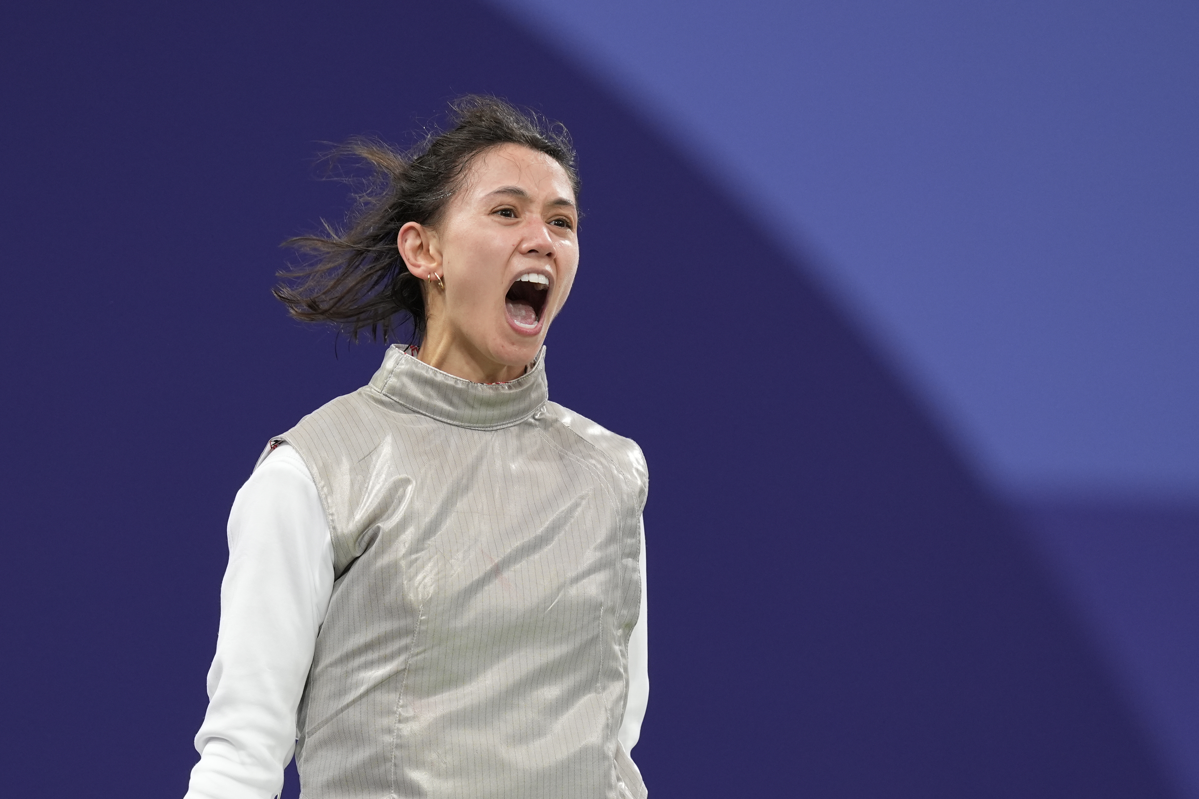 United States' Lee Kiefer reacts as she competes with Canada's Yunjia Zhang in the women's team foil semifinal match during the 2024 Summer Olympics at the Grand Palais, Thursday, Aug. 1, 2024, in Paris, France. 