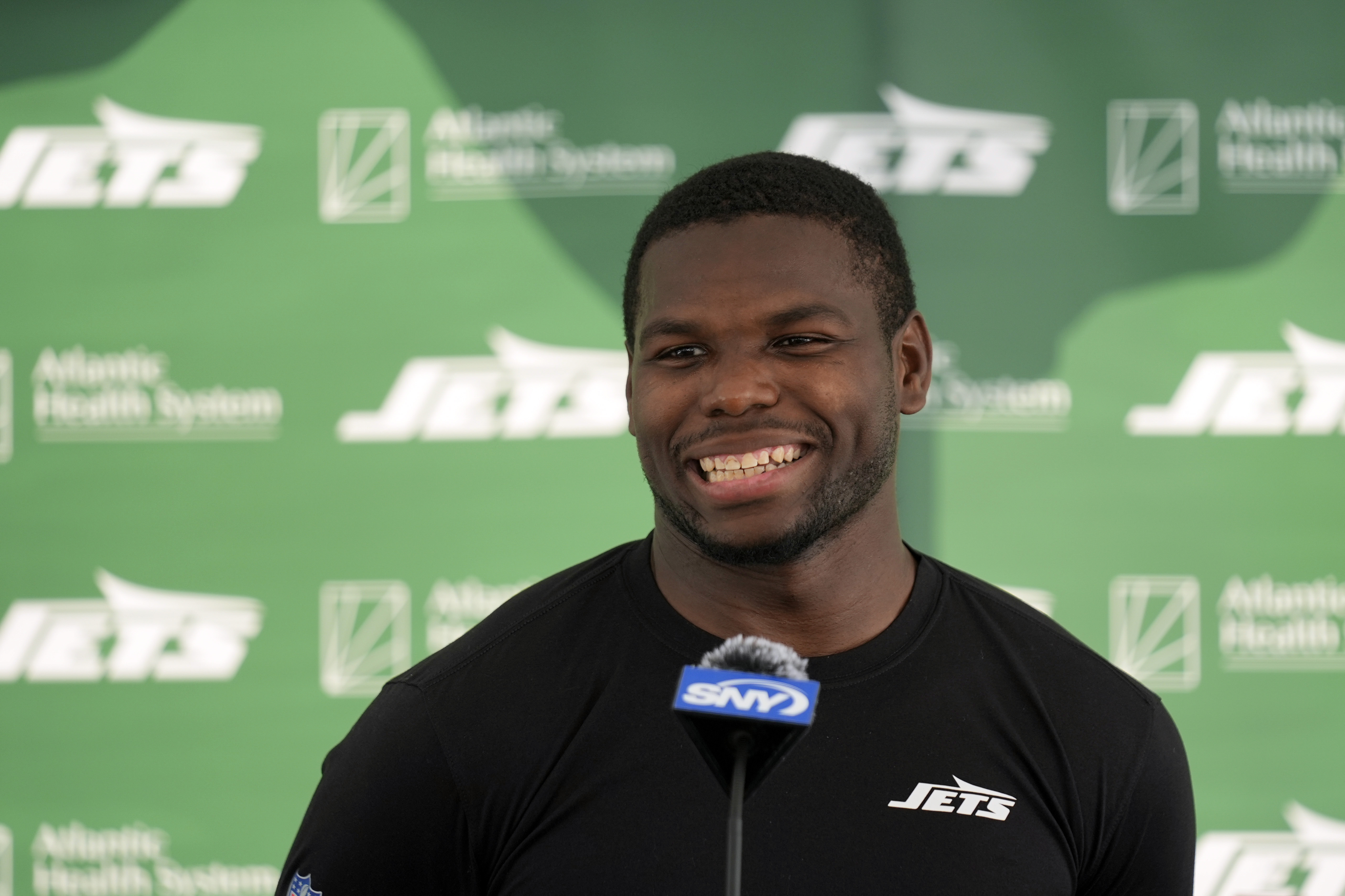 New York Jets' Tarik Cohen speaks to reporters after a practice at the NFL football team's training facility in Florham Park, N.J., Tuesday, July 30, 2024. 