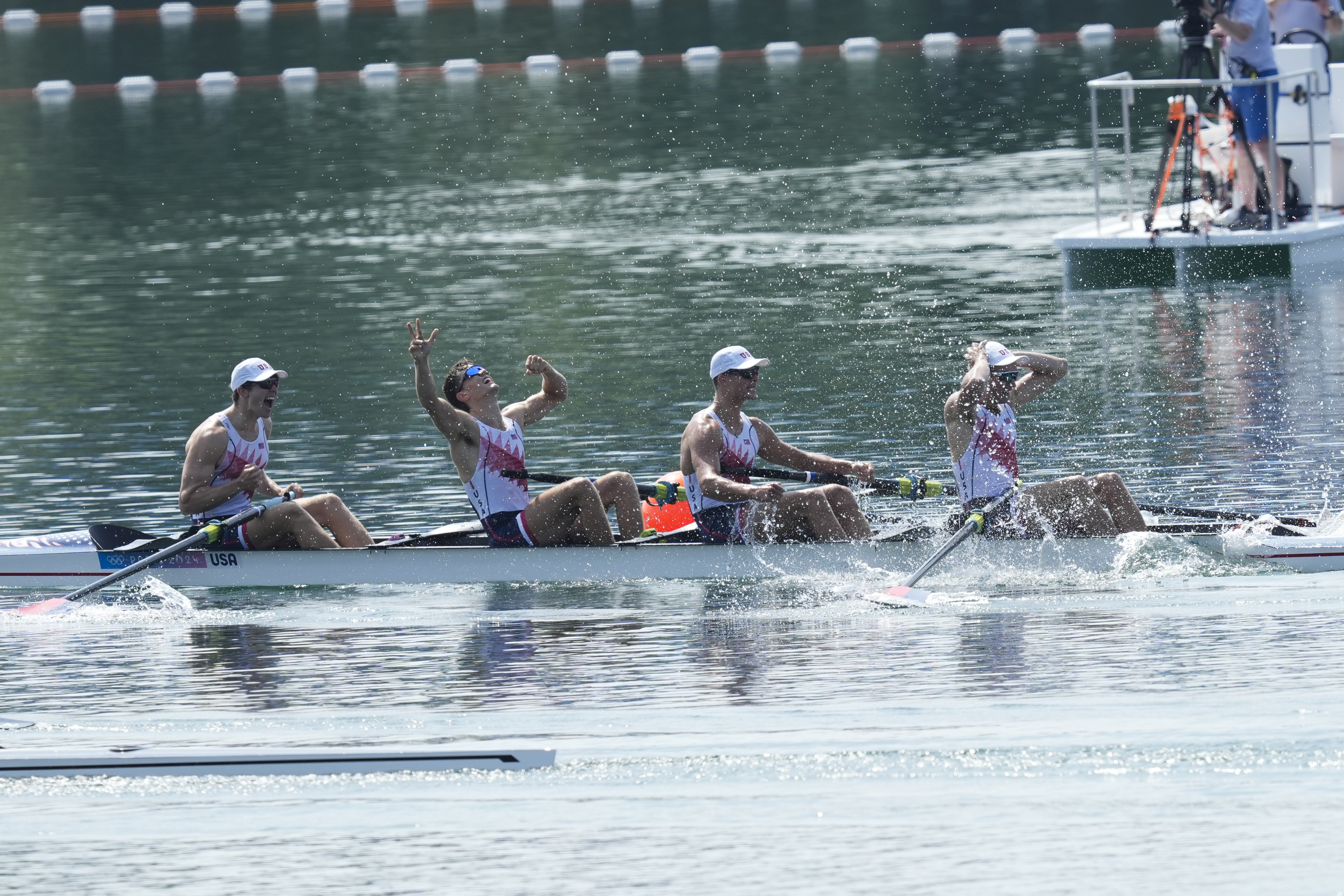 United States' Michael Grady, Nick Mead, Liam Corrigan and Justin Best celebrate gold in the men's four final at the 2024 Summer Olympics, Thursday, Aug. 1, 2024, in Vaires-sur-Marne, France. 