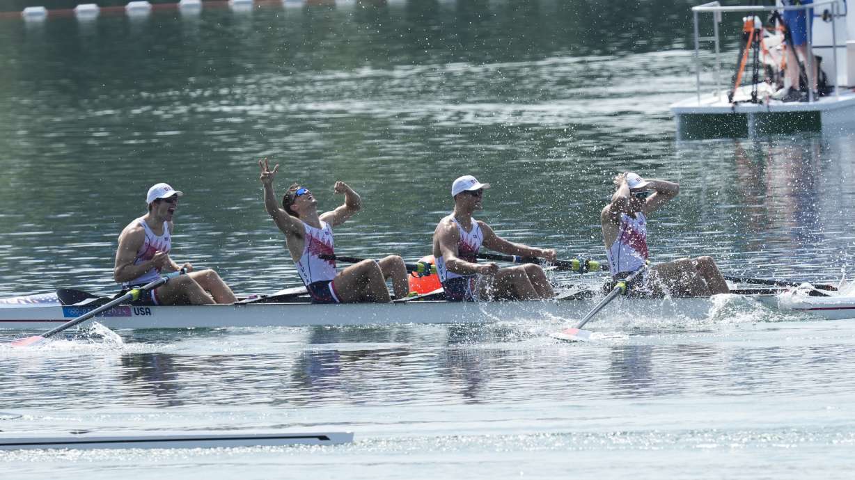 United States' Michael Grady, Nick Mead, Liam Corrigan and Justin Best celebrate gold in the men's four final at the 2024 Summer Olympics, Thursday, Aug. 1, 2024, in Vaires-sur-Marne, France.