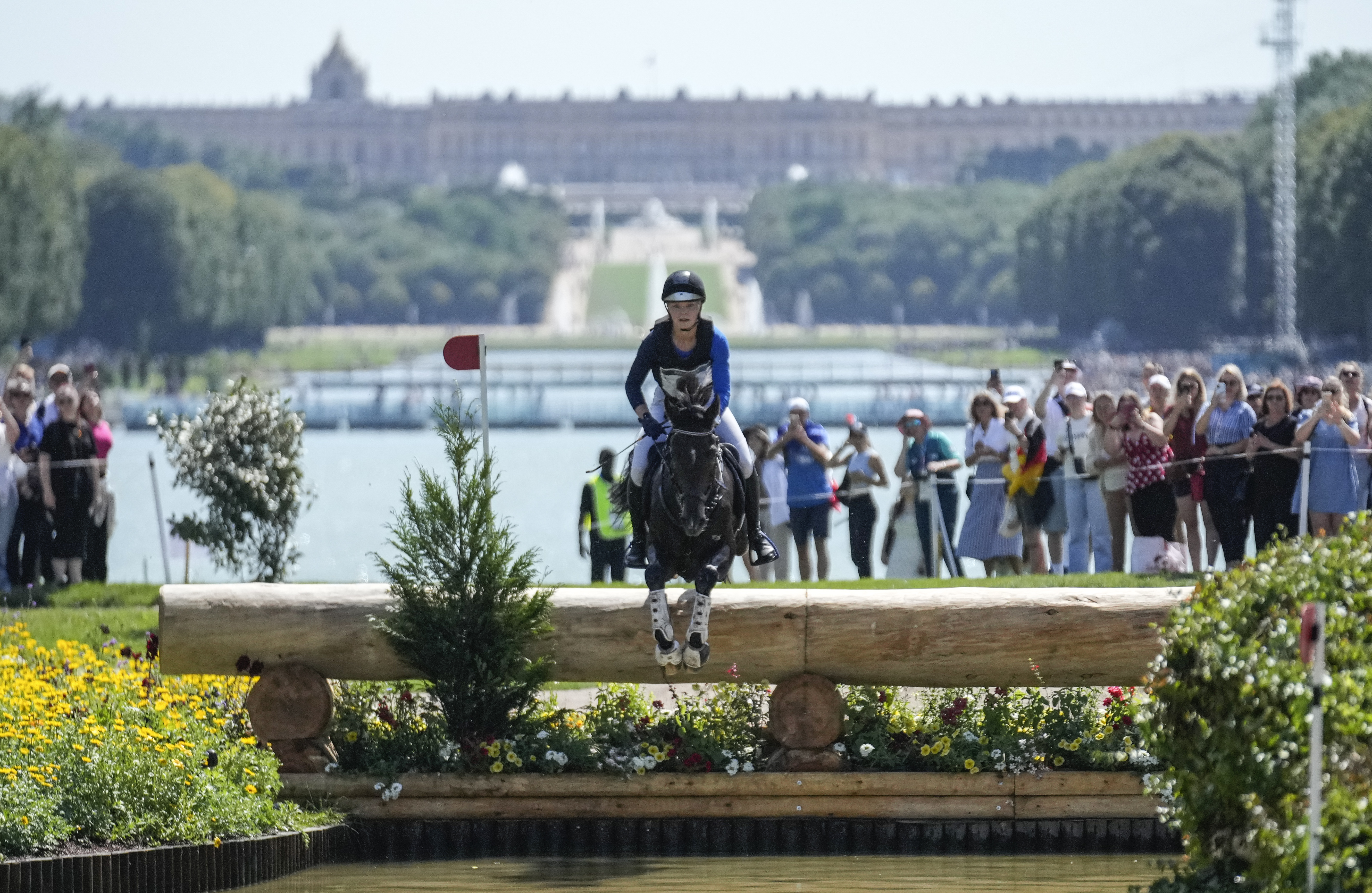 Finalnd's Veera Manninen, riding Sir Greg, during the Equestrian Cross Country competition at Chateau de Versailles for the 2024 Summer Olympics, Sunday, July 28, 2024, in Versailles, France. 