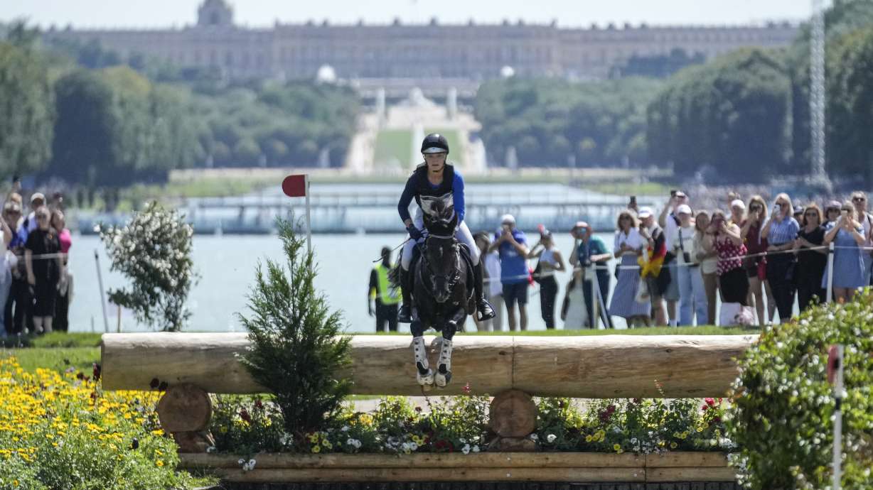Finalnd's Veera Manninen, riding Sir Greg, during the Equestrian Cross Country competition at Chateau de Versailles for the 2024 Summer Olympics, Sunday, July 28, 2024, in Versailles, France.