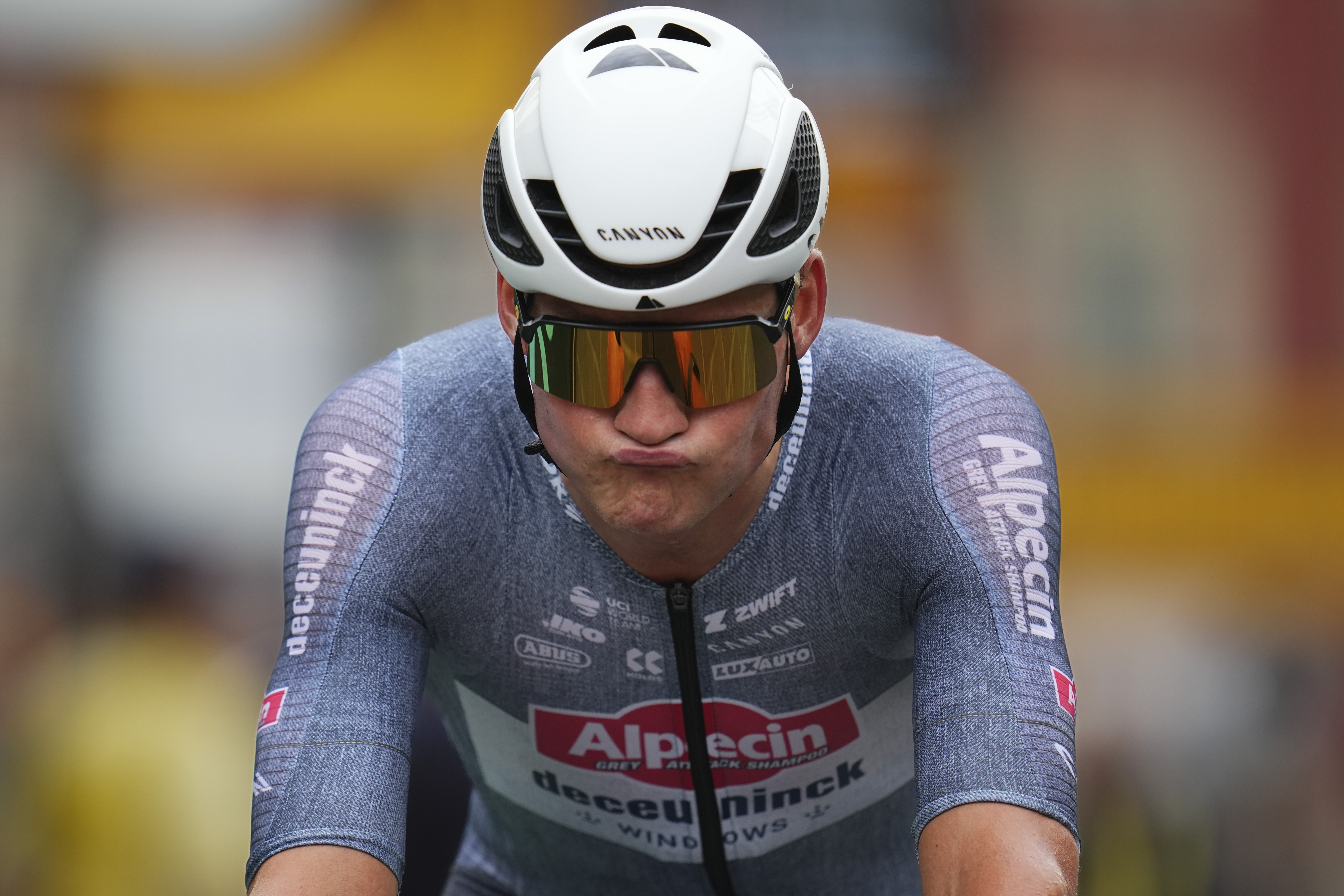 Netherlands' Mathieu van der Poel reacts after crossing the finish line of the twenty-first stage of the Tour de France cycling race, an individual time trial over 33.7 kilometers (20.9 miles) with start in Monaco and finish in Nice, France, Sunday, July 21, 2024. 