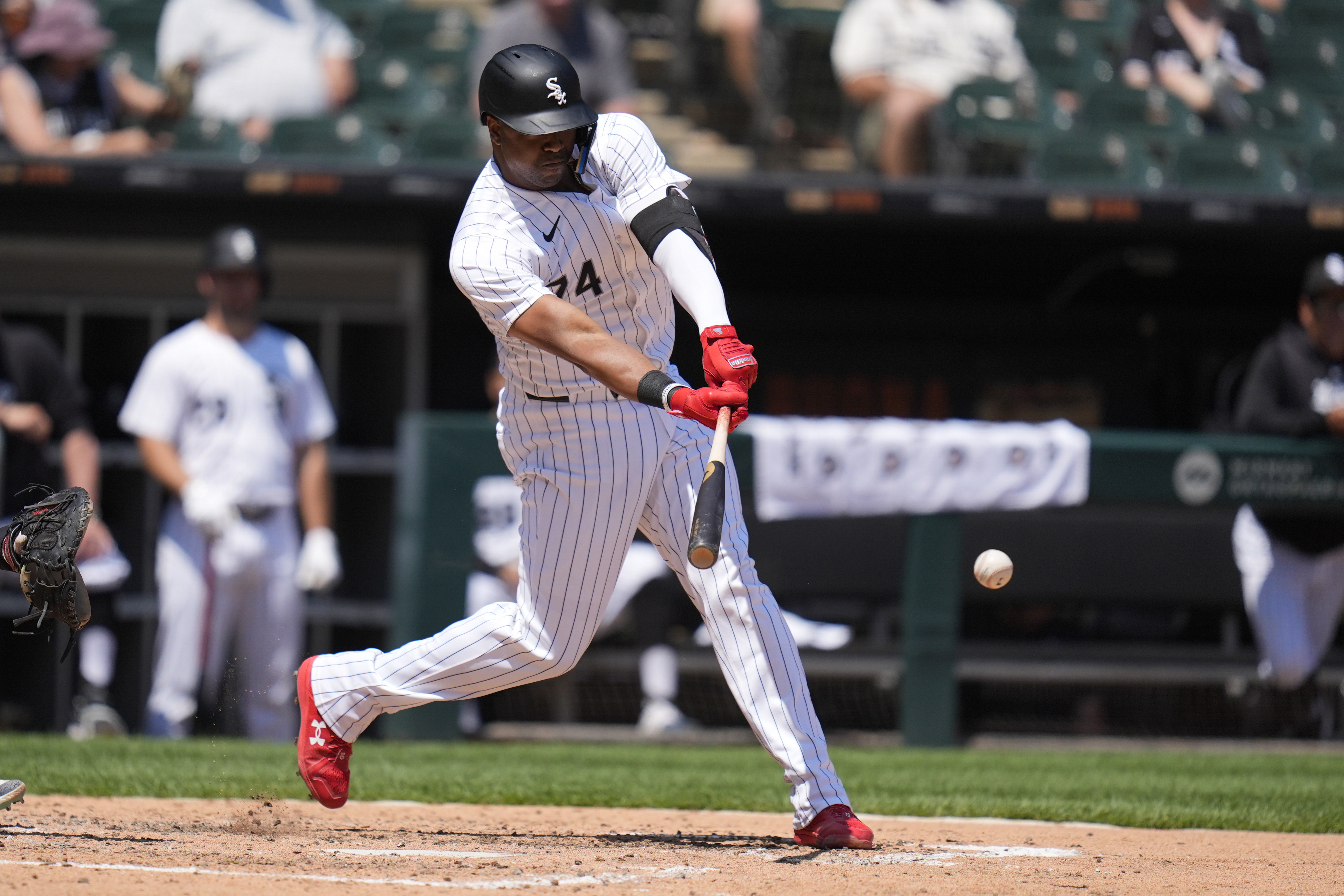 Chicago White Sox designated hitter Eloy Jiménez hits a single during the fifth inning of a baseball game against the Minnesota Twins, Wednesday, July 10, 2024, in Chicago. 