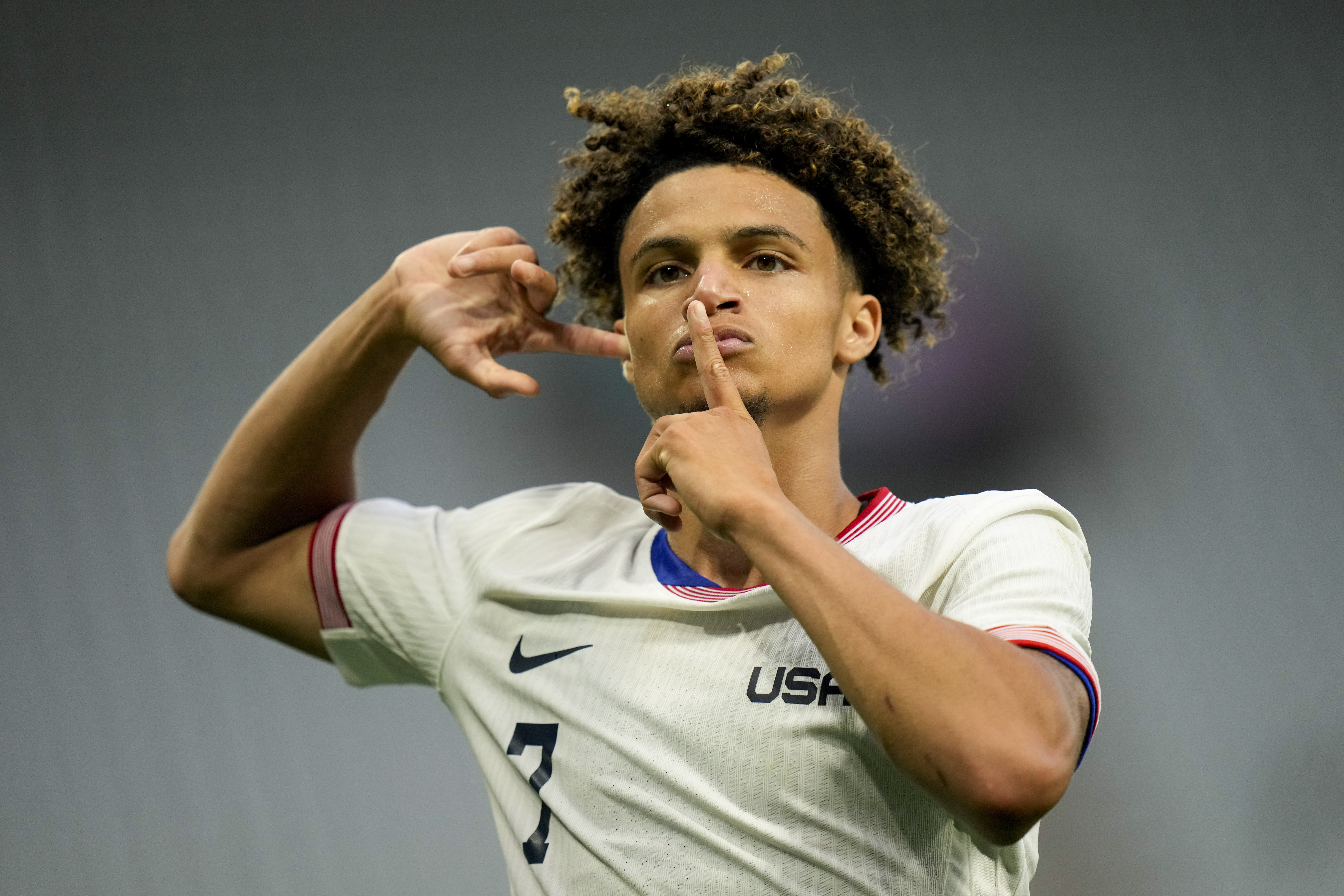 United States' Kevin Paredes celebrates scoring his side's 3rd goal during the men's Group A soccer match between the United States and Guinea, at Geoffroy-Guichard Stadium, during the 2024 Summer Olympics, Tuesday, July 30, 2024, in Saint-Etienne, France. 