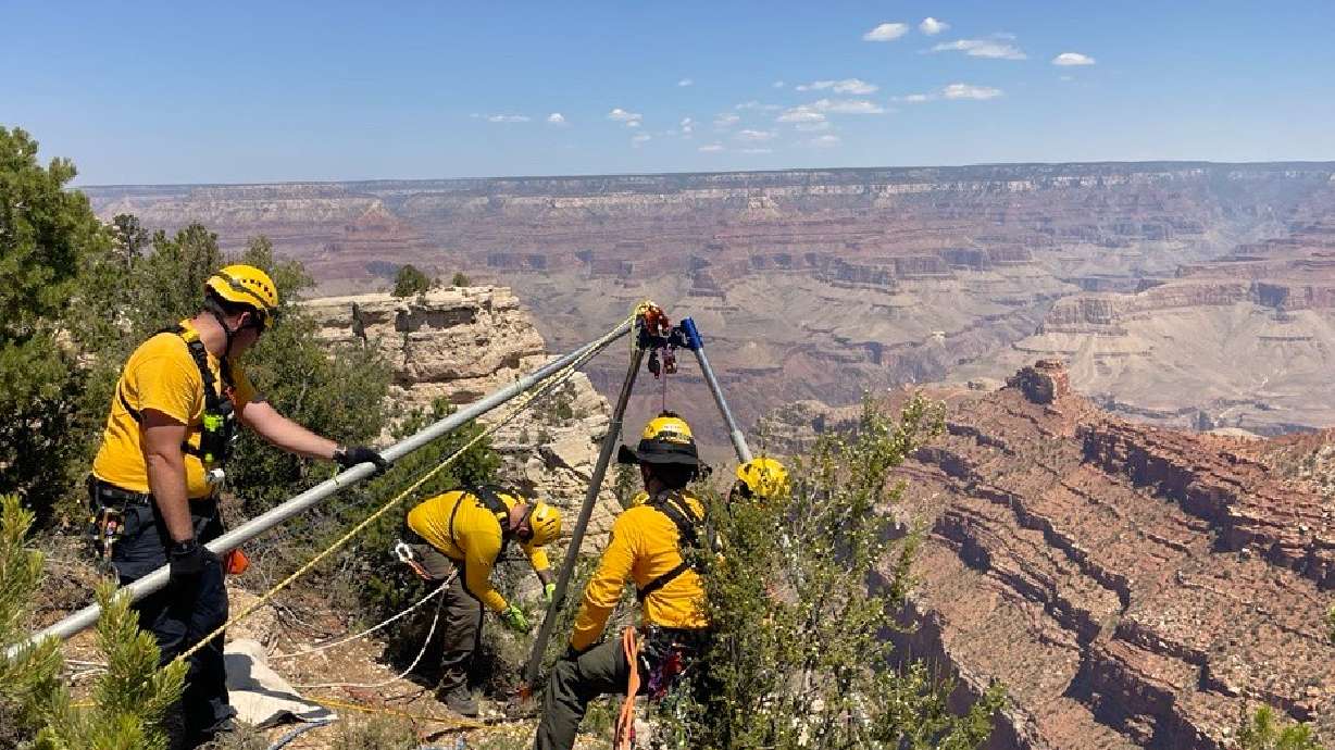 Grand Canyon National Park responders manage a high angle technical rescue system to recovery the body of a man who died from a fall from a South Rim overlook on Wednesday