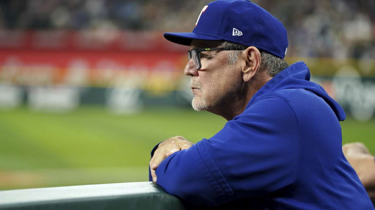 Texas Rangers manager Bruce Bochy watches from the dugout during the eighth inning of a baseball game against the Baltimore Orioles, Saturday, July 20, 2024, in Arlington, Texas.