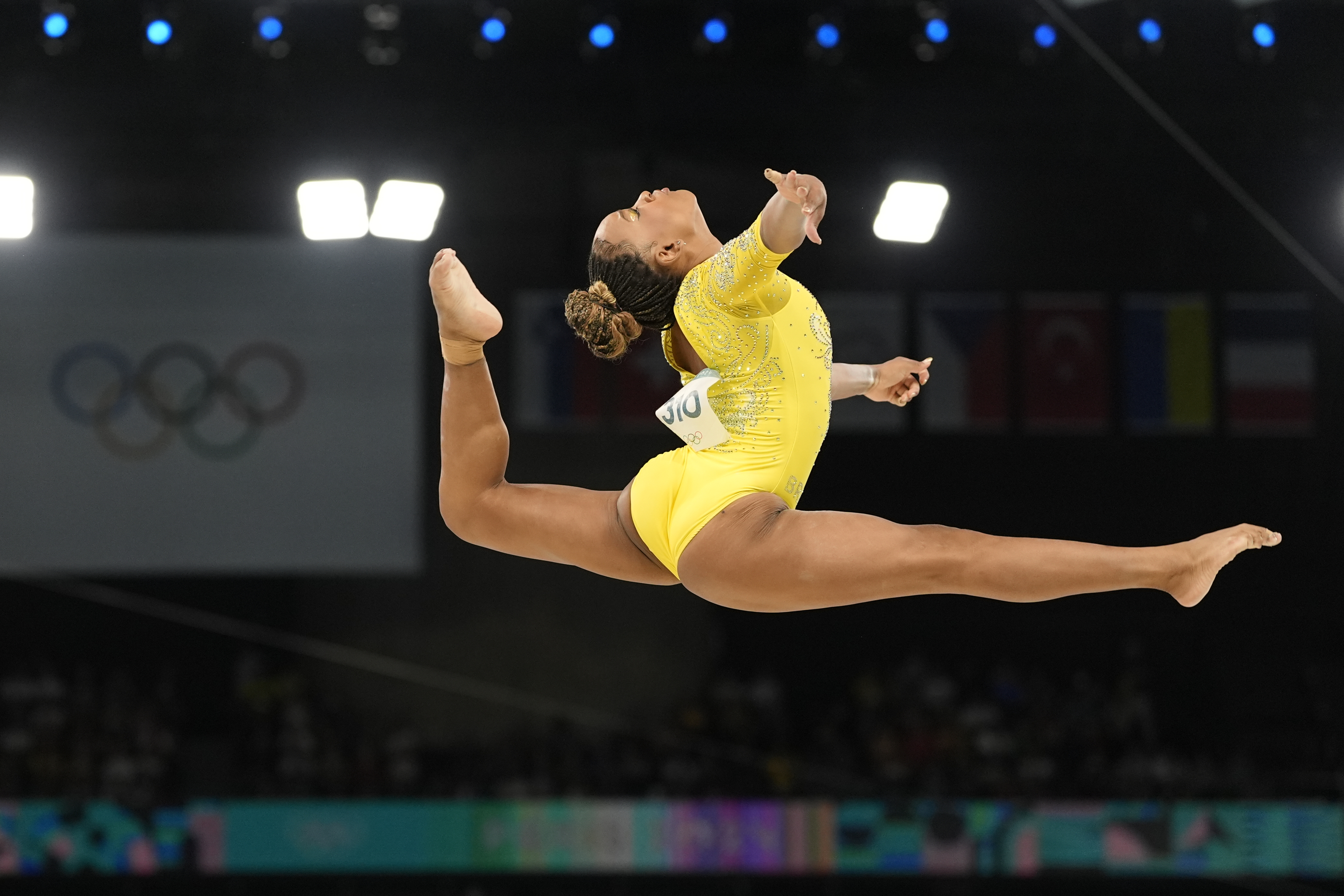 Rebeca Andrade, of Brazil, performs on the balance beam during the women's artistic gymnastics all-around finals in Bercy Arena at the 2024 Summer Olympics, Thursday, Aug. 1, 2024, in Paris, France. 