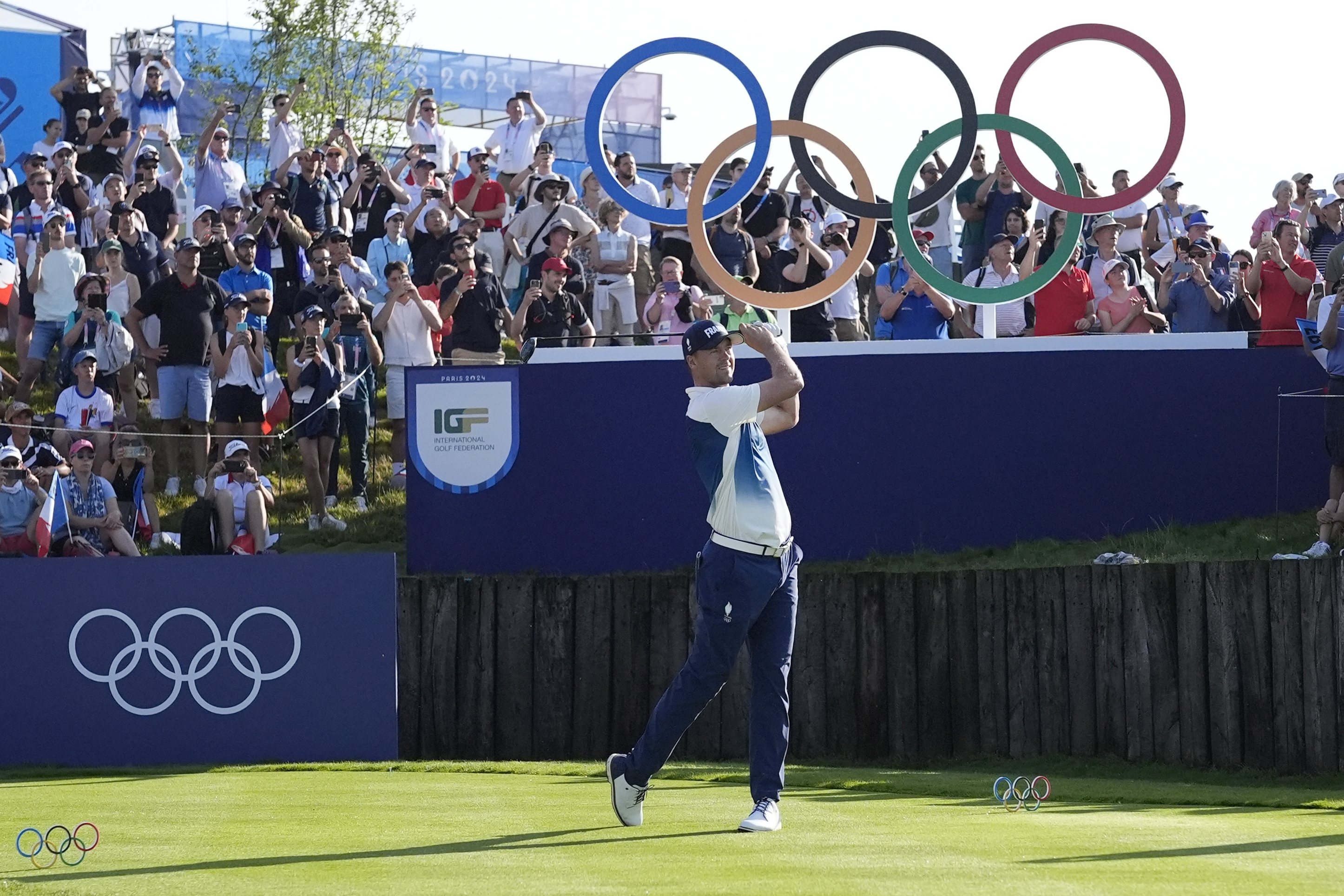 Victor Perez, of France, plays his tee shot off the first tee during the first round of the men's golf event at the 2024 Summer Olympics, Thursday, Aug. 1, 2024, at Le Golf National in Saint-Quentin-en-Yvelines, France. 