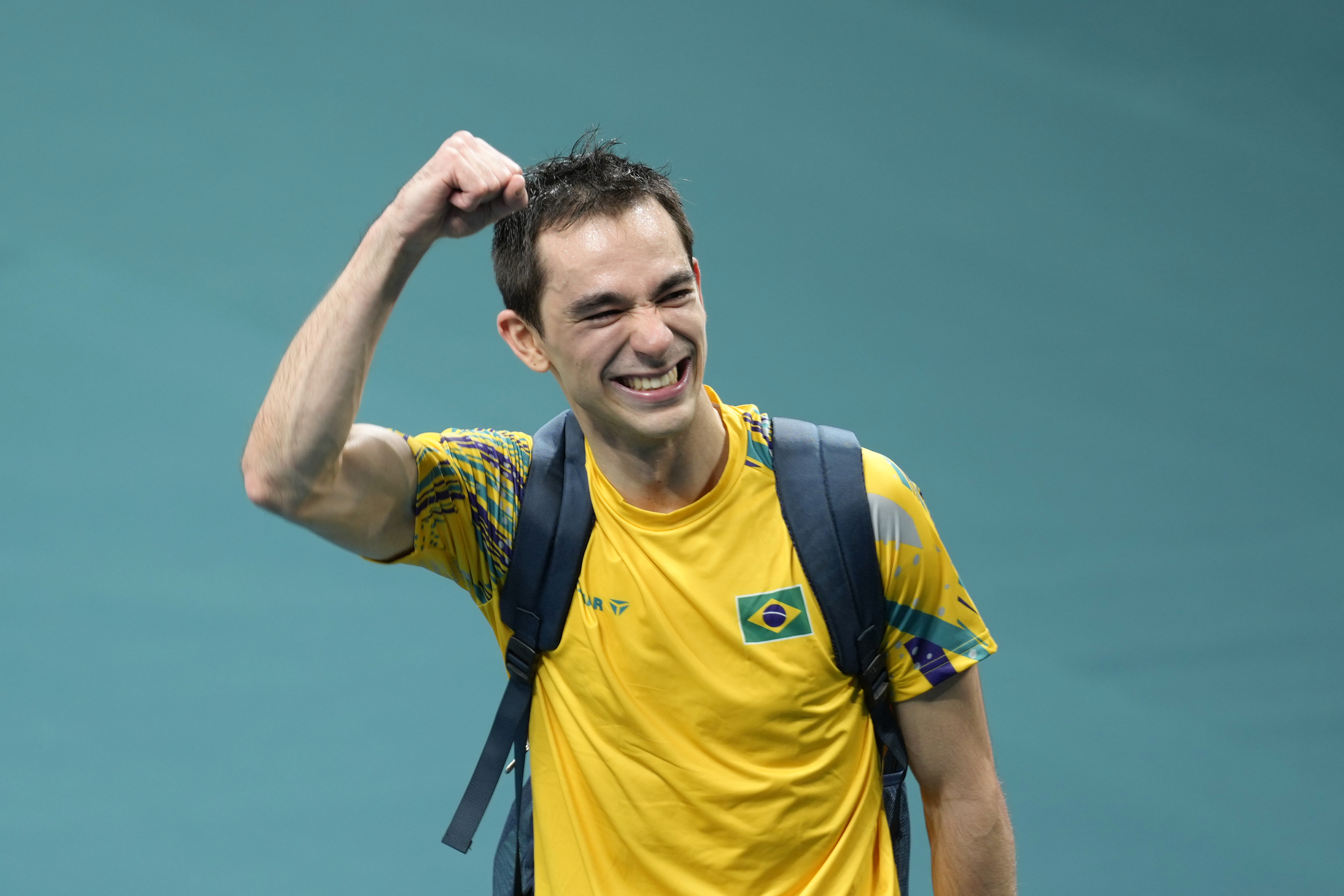 Brazil's Hugo Calderano reacts after his win against South Korea's Jang Woojin in a men's singles quarterfinal table tennis match at the 2024 Summer Olympics, Thursday, Aug. 1, 2024, in Paris, France. 