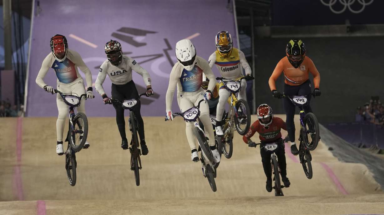 From left, Joris Daudet of France, Cameron Wood of The United States, Romain Mahieu of France, Diego Alejandro Arboleda Ospina of Colombia, Dean Reeves of Morocco and Dave van der Burg of the Netherlands compete in the men's BMX racing event, at the 2024 Summer Olympics, Thursday, Aug. 1, 2024, in Saint-Quentin-en-Yvelines, France.