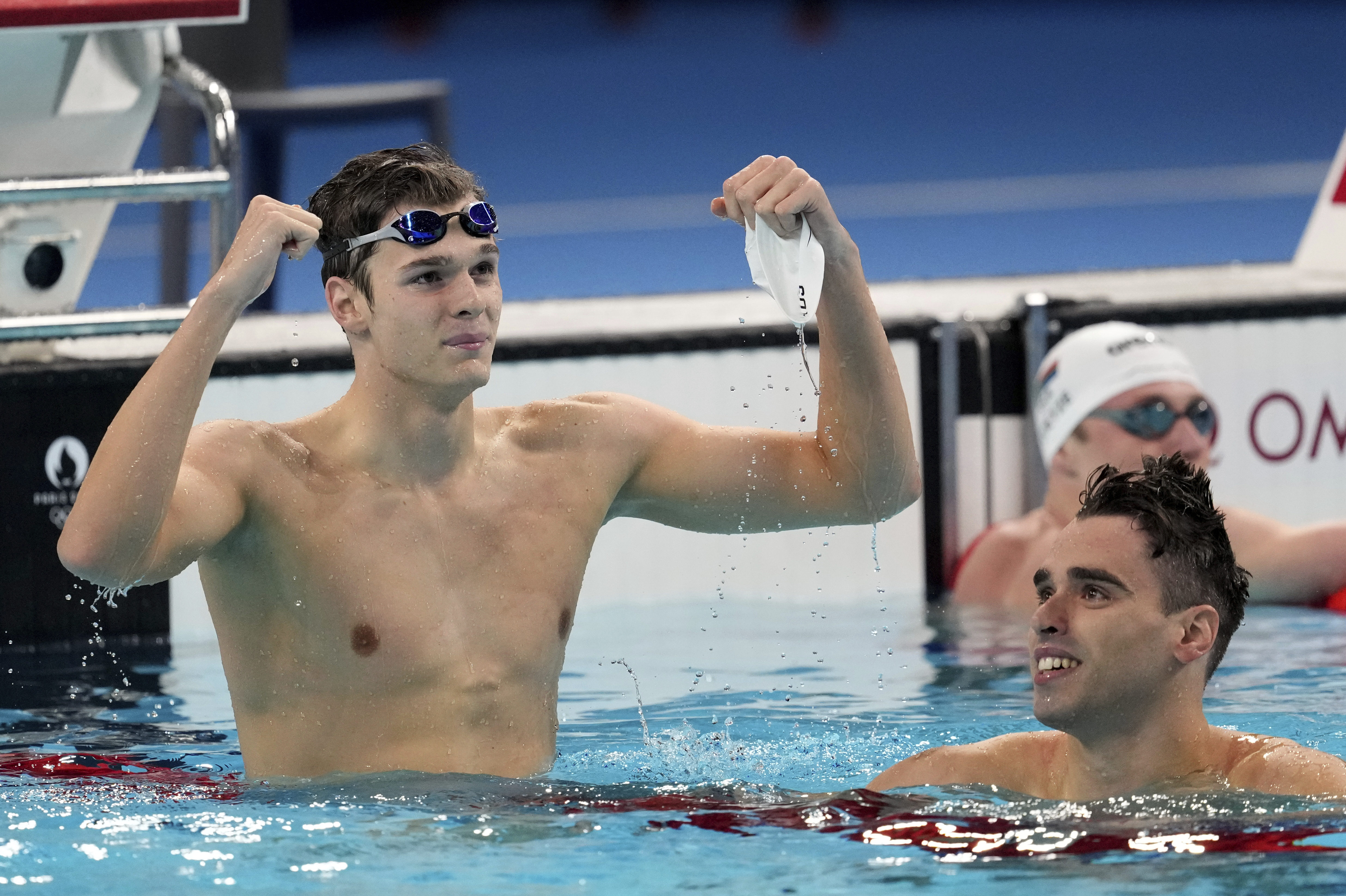 Hubert Kos, of Hungary, celebrates winning the men's 200-meter backstroke final at the 2024 Summer Olympics in Nanterre, France, Thursday, Aug. 1, 2024. 
