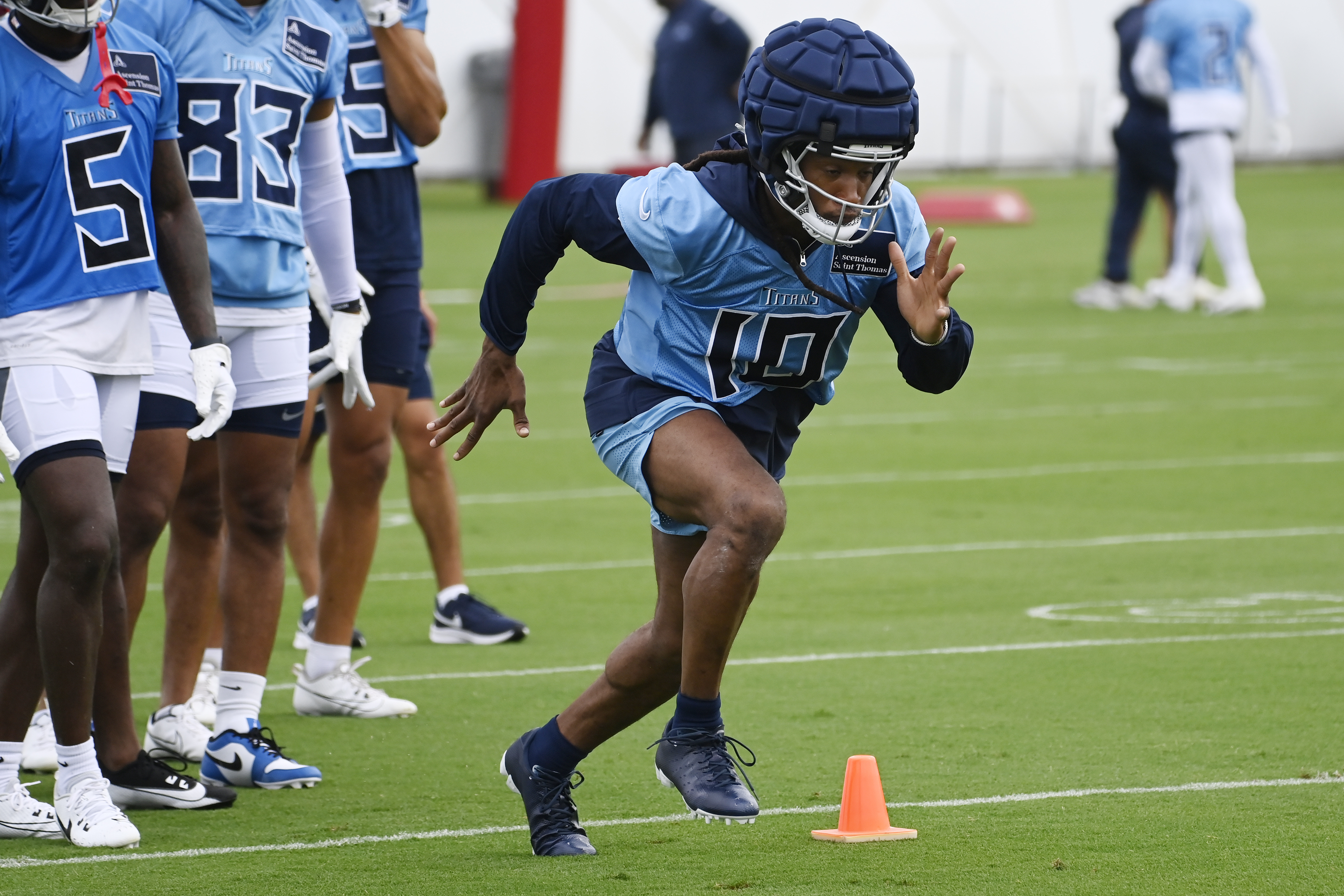 Tennessee Titans wide receiver DeAndre Hopkins (10) runs through a drill during an NFL football training camp practice Wednesday, July, 24, 2024, in Nashville, Tenn.