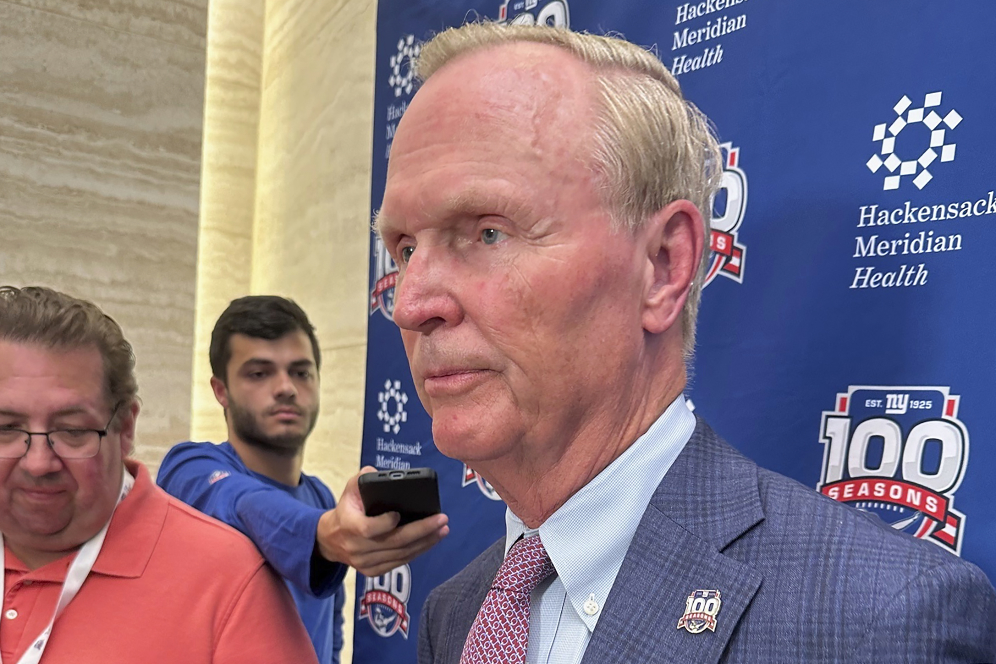 New York Giants co-owner John Mara speaks to the media Thursday, Aug. 1, 2024, about his expectations for this football season after a news conference at Hackensack Medical Center in Hackensack, N.J., to celebrate a partnership with the hospital as the team commemorates its 100th NFL season. 
