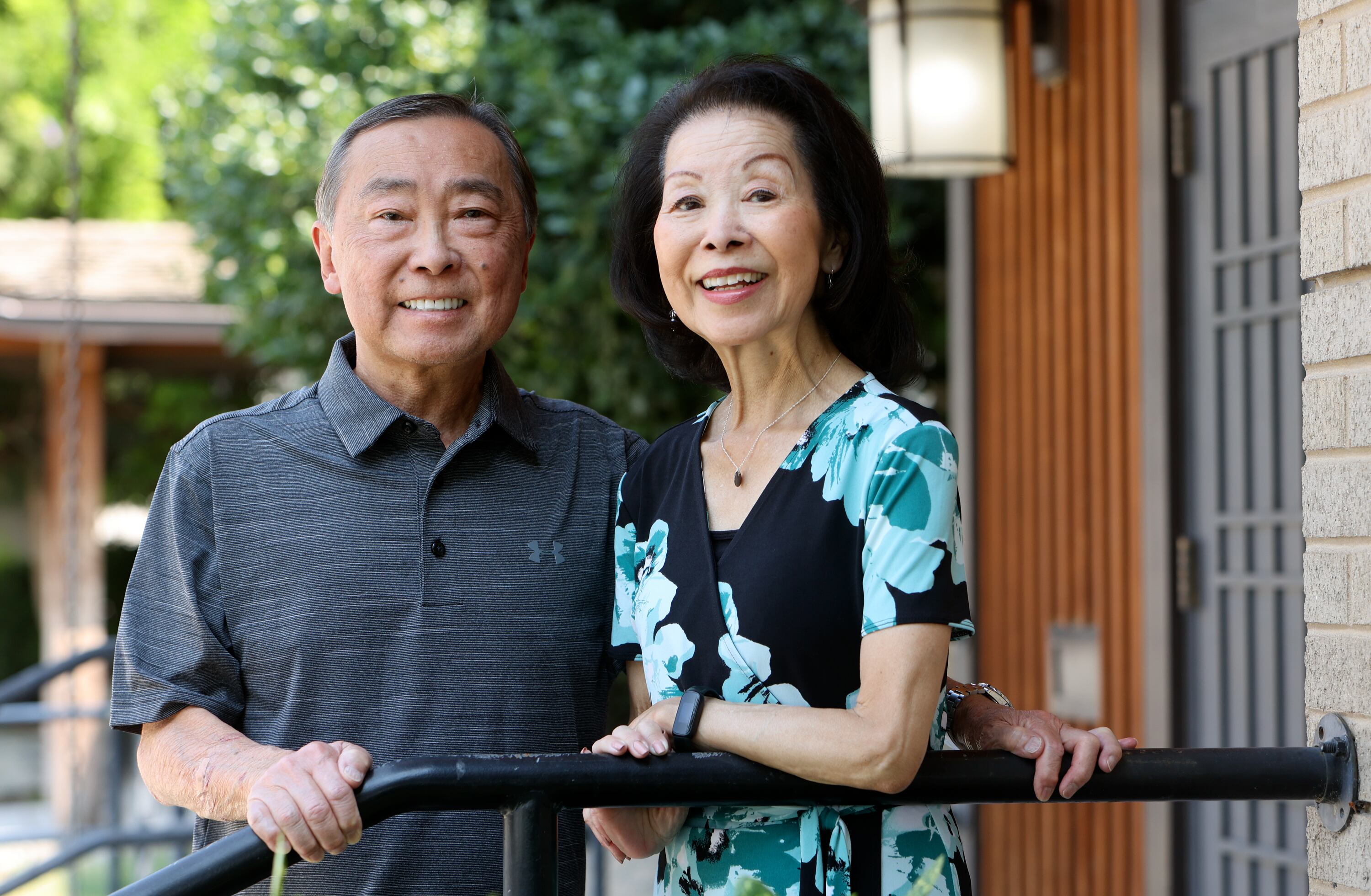 Paul and Sandy Iwasaki pose for a portrait on the steps of the Salt Lake Buddhist Temple in Salt Lake City’s Japantown neighborhood on Monday, July 22, 2024. Paul grew up in Japantown and Sandy frequented the neighborhood growing up.