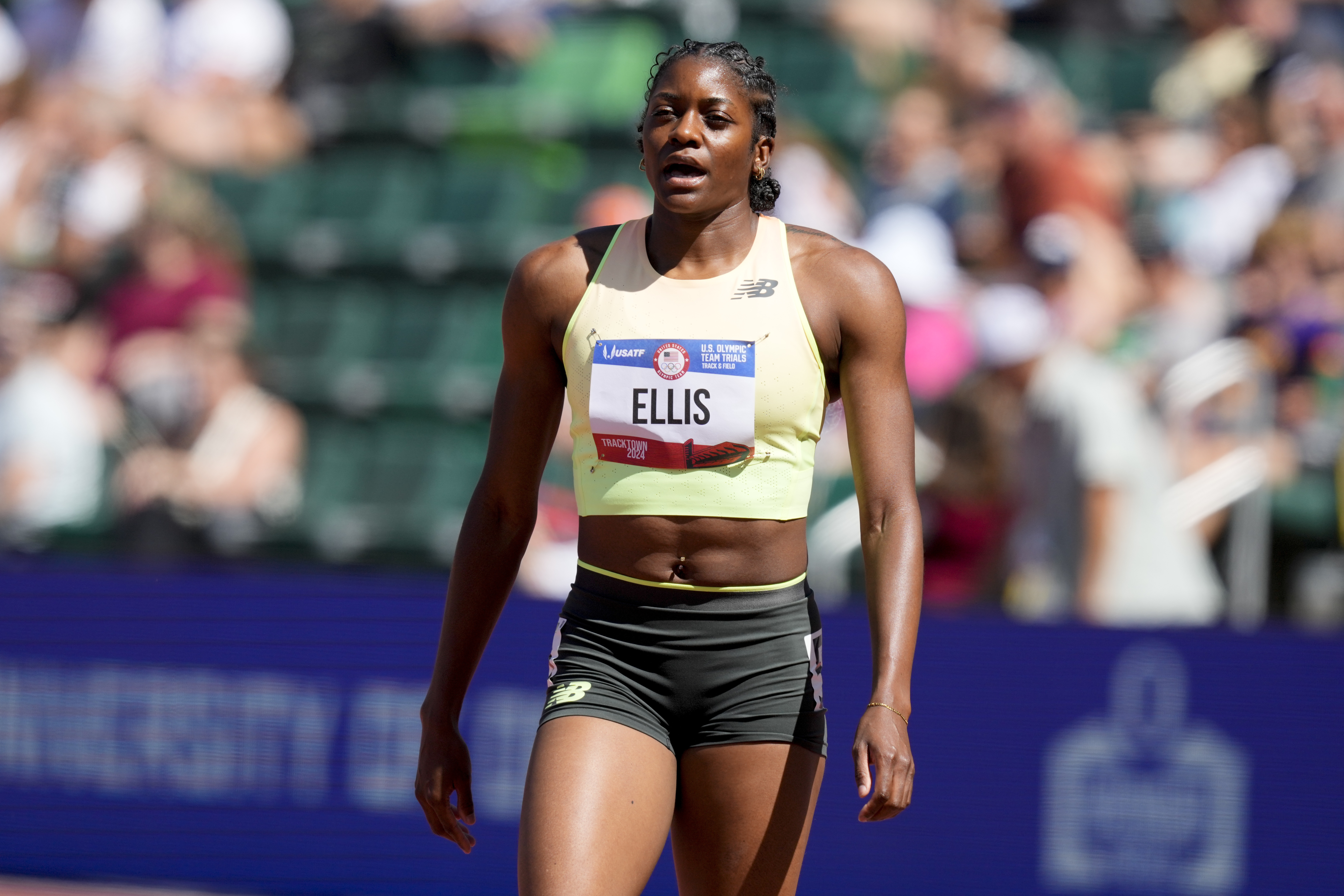 FILE - Kendall Ellis arrives for a heat women's 400-meter run during the U.S. Track and Field Olympic Team Trials, June 21, 2024, in Eugene, Ore. 