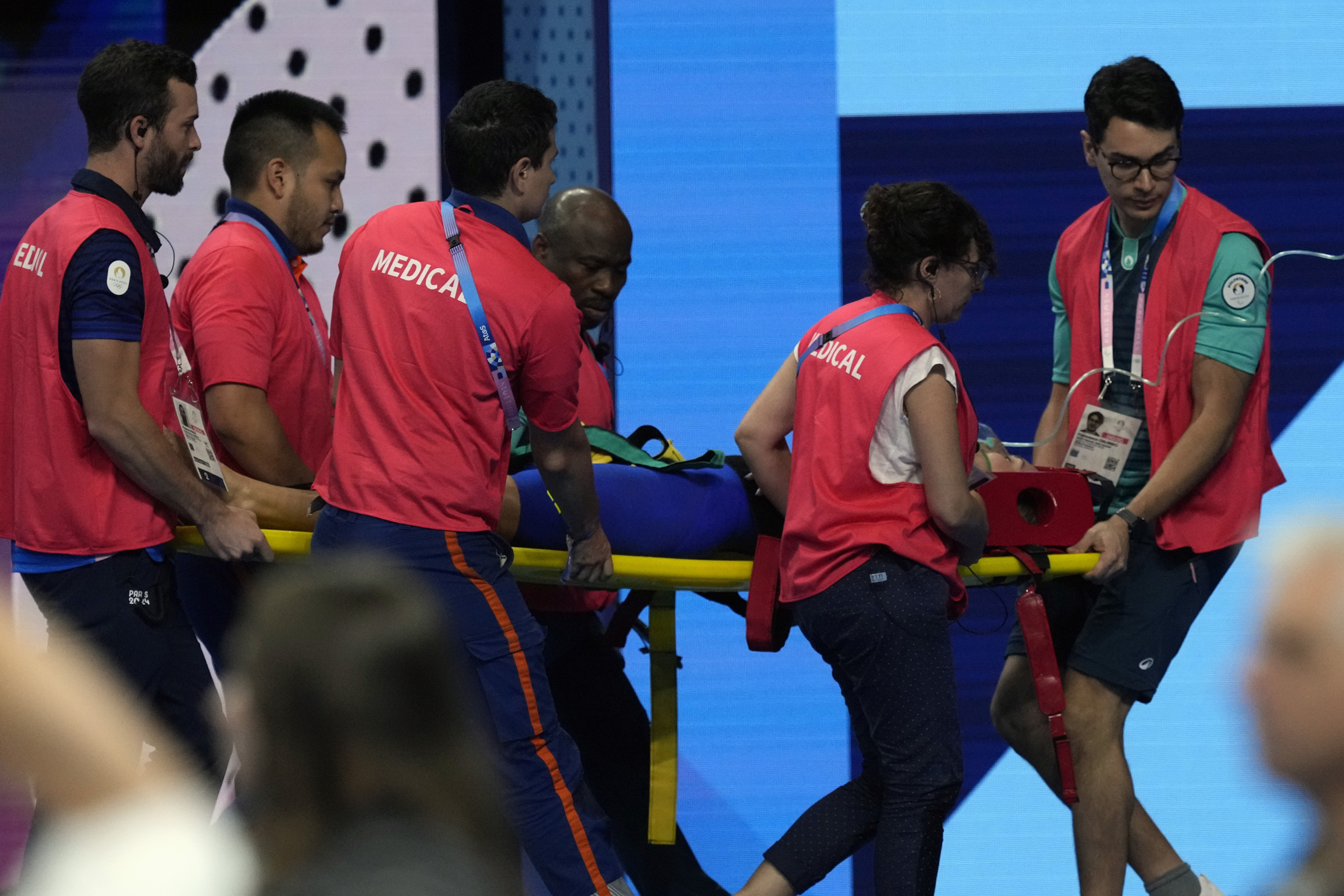 Slovakia’s Tamara Potocka is taken on stretcher from the pool deck after collapsing following a heat of the women's 200-meter individual medley at the 2024 Summer Olympics, Friday, Aug. 2, 2024, in Nanterre, France. 