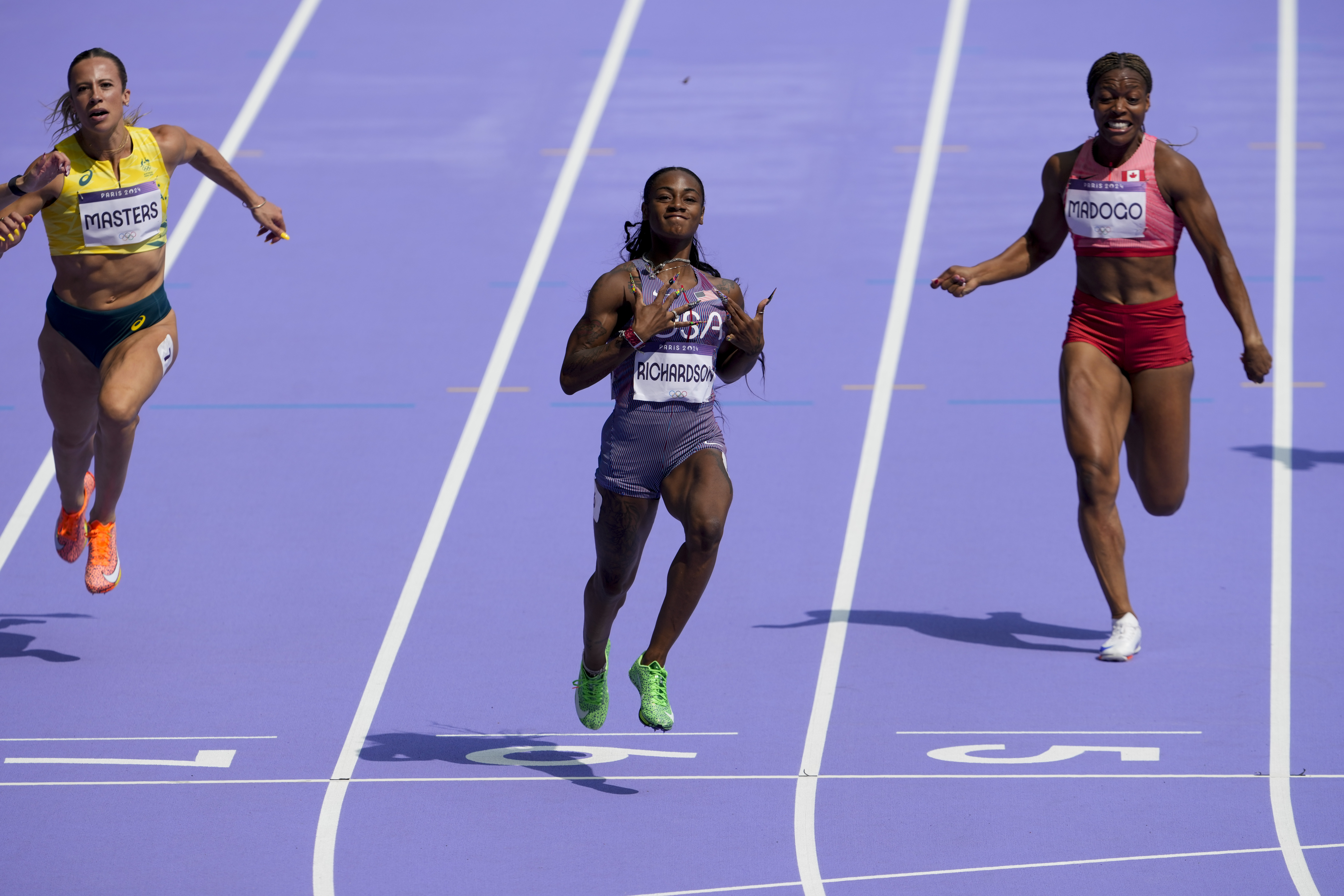 Sha'carri Richardson of the United States, wins a heat in the women's 100-meter run at the 2024 Summer Olympics, Friday, Aug. 2, 2024, in Saint-Denis, France.