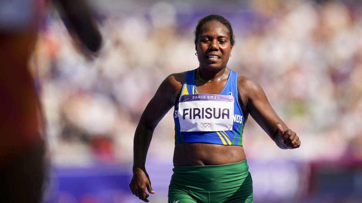 Sharon Firisua, of Solomon Islands, competes in the women's 100-meter run at the 2024 Summer Olympics, Friday, Aug. 2, 2024, in Saint-Denis, France.