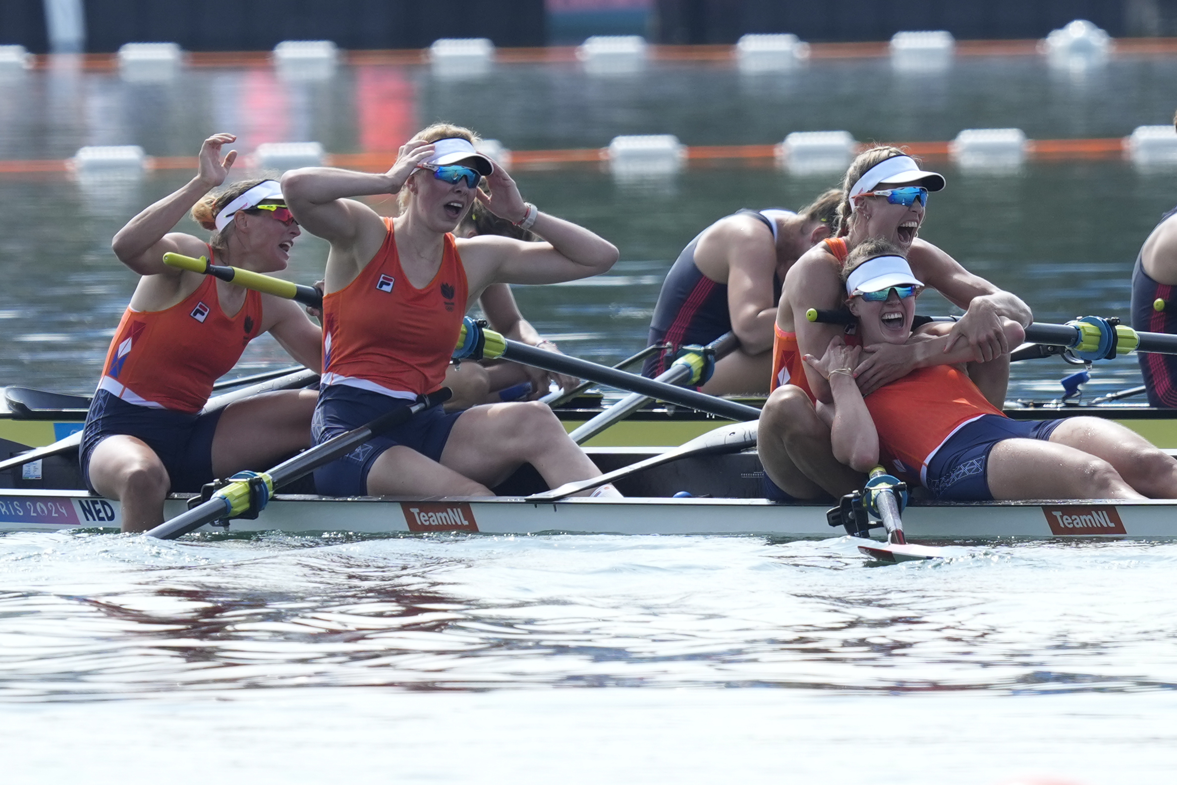Netherland's Hermijntje Drenth, Marloes Oldenburg, Tinka Offereins and Benthe Boonstra celebrate gold in the women's four final at the 2024 Summer Olympics, Thursday, Aug. 1, 2024, in Vaires-sur-Marne, France.