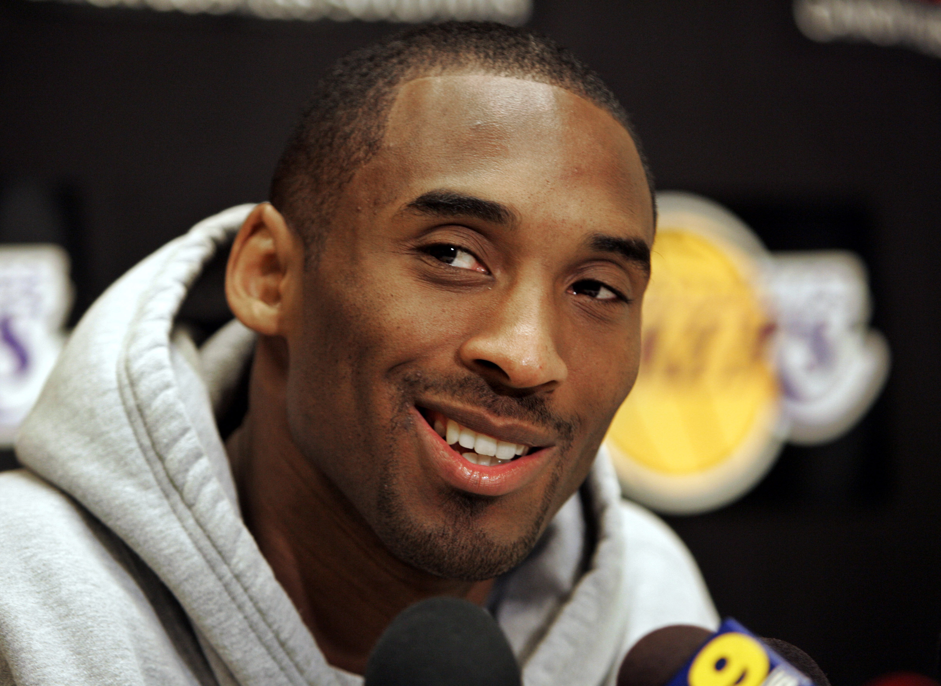 FILE - Los Angeles Lakers basketball star Kobe Bryant smiles as he talks about his 81-point game Jan. 22, 2006, against the Toronto Raptors at Lakers headquarters in El Segundo, Calif., Jan. 24, 2006. A statue of Bryant and his daughter, Gigi Bryant, was scheduled to be unveiled during a private ceremony on Friday, Aug. 2, 2024 according to a published report.