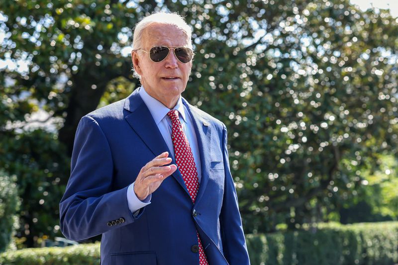 President Joe Biden walks toward the South Lawn of the White House as he departs on travel to Wilmington, Del. in Washington, Friday. He said the U.S. is not giving up on getting U.S. teacher out of Russia.