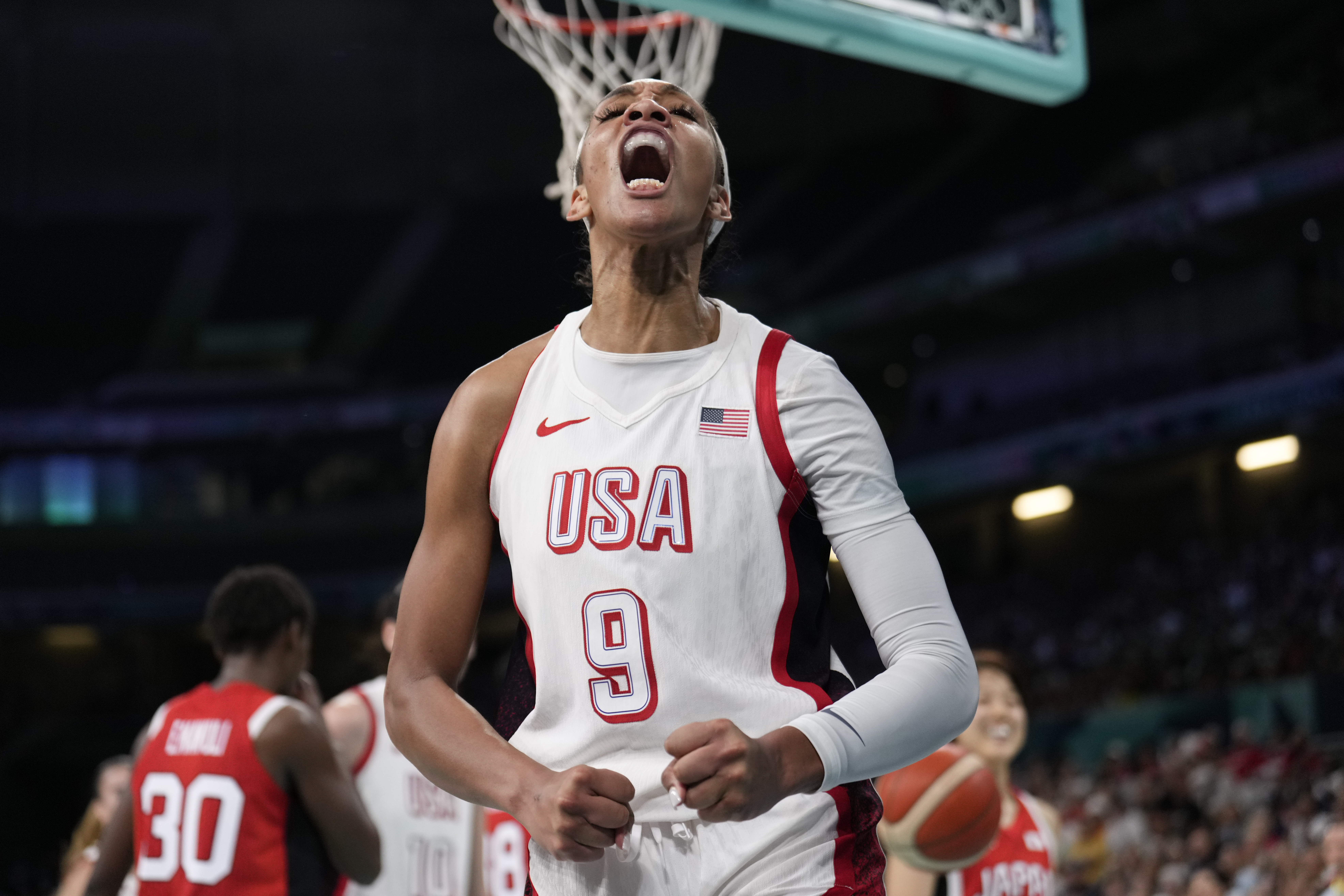 A'ja Wilson, of the Unites States, celebrates after scoring against Japan in a women's basketball game at the 2024 Summer Olympics, Monday, July 29, 2024, in Villeneuve-d'Ascq, France. 